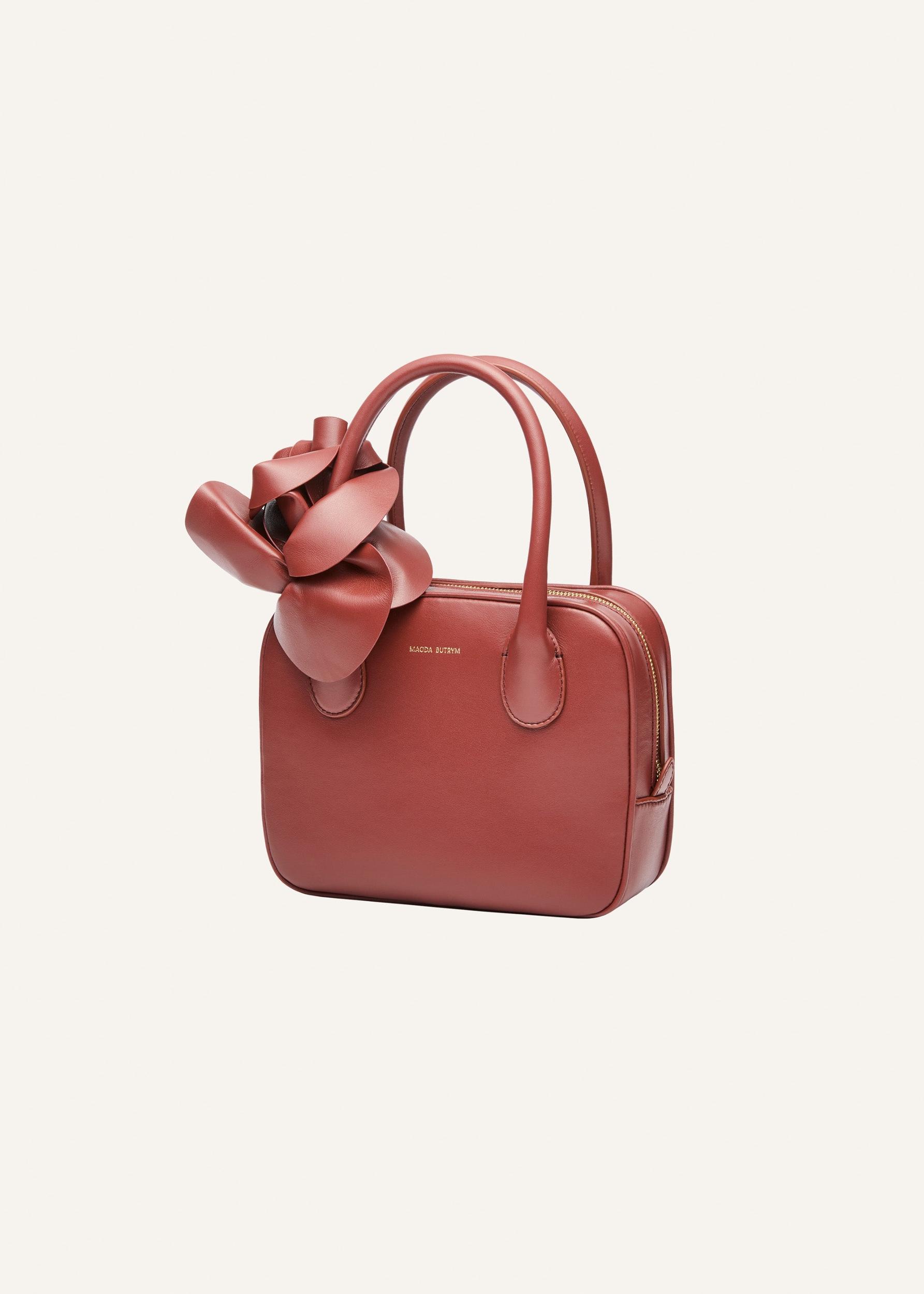 Brigitte square bag in amber leather and gold Product Image