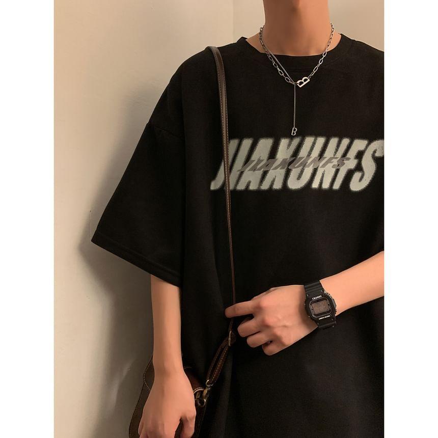 Short-Sleeve Crew Neck Lettering Print Faux Suede Tee Product Image