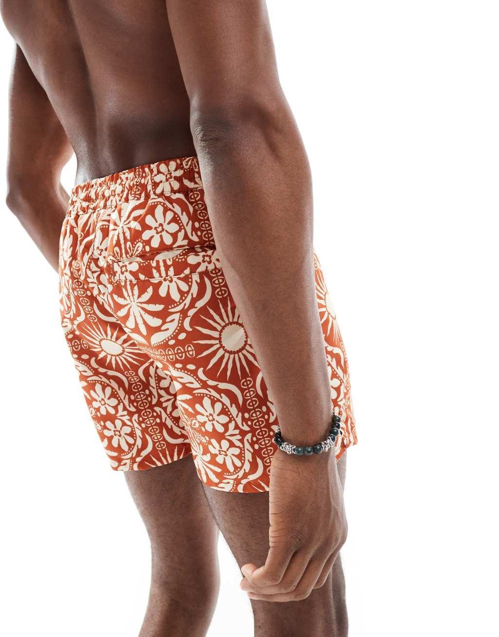 Aray sun dile print swim shorts in rust Product Image