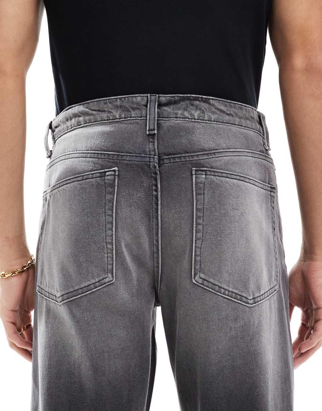 ASOS DESIGN wide flare jeans in washed black Product Image