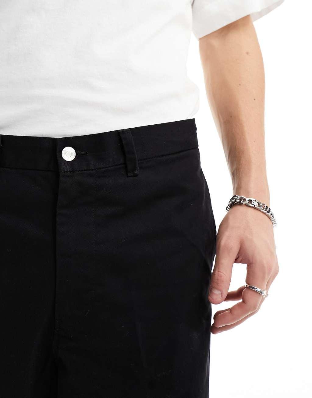 Weekday Astro loose fit wide leg pants in black Product Image