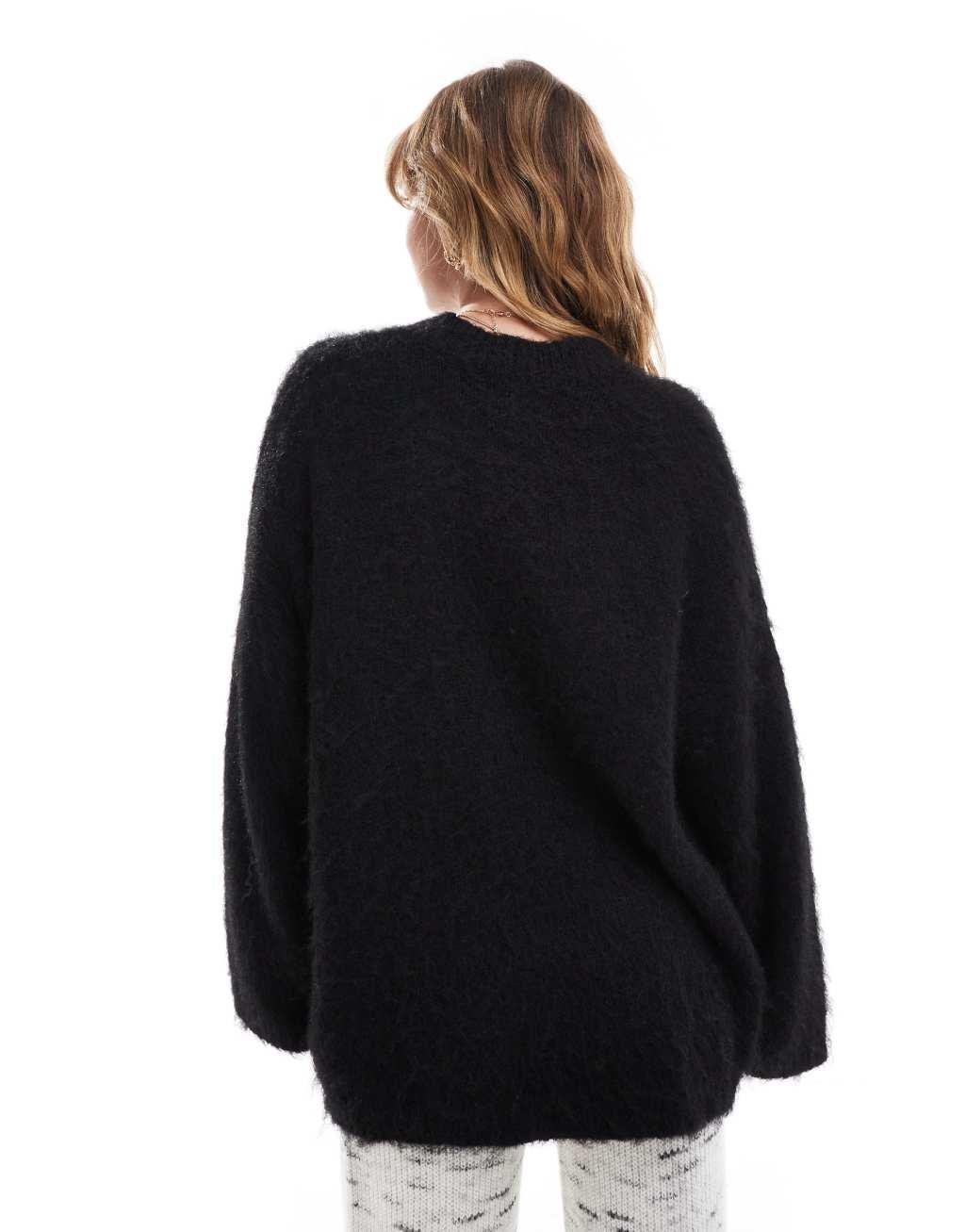 ASOS DESIGN brushed crew neck sweater in black Product Image