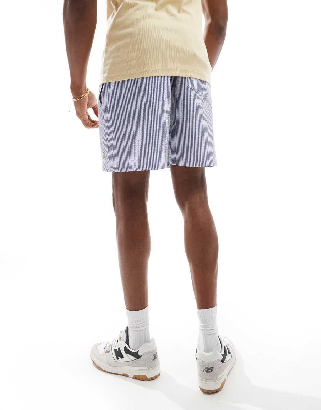 Polo Ralph Lauren Traveler icon logo seersucker stripe swim shorts in blue Product Image