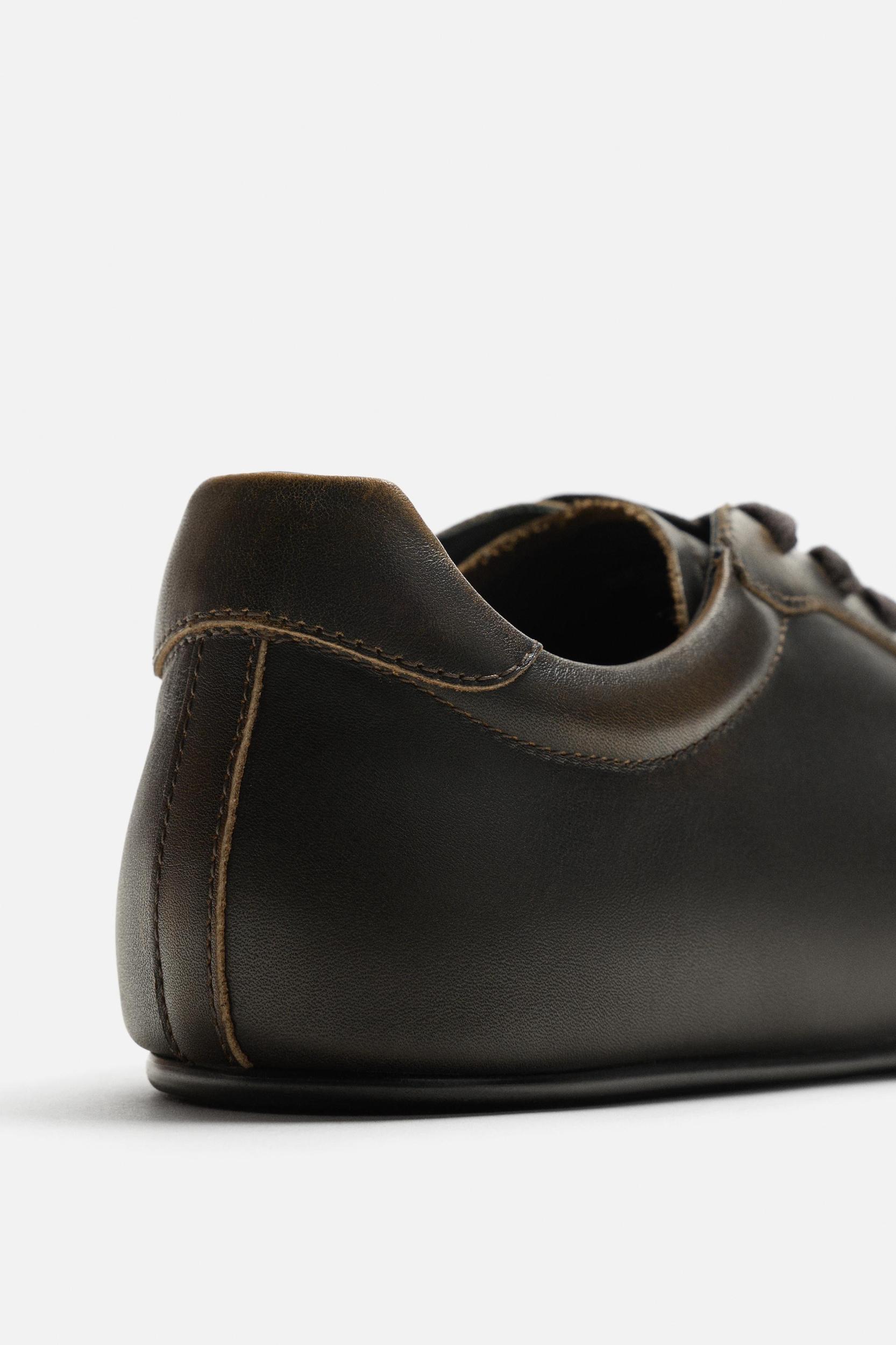 LIMITED EDITION LEATHER SNEAKERS Product Image