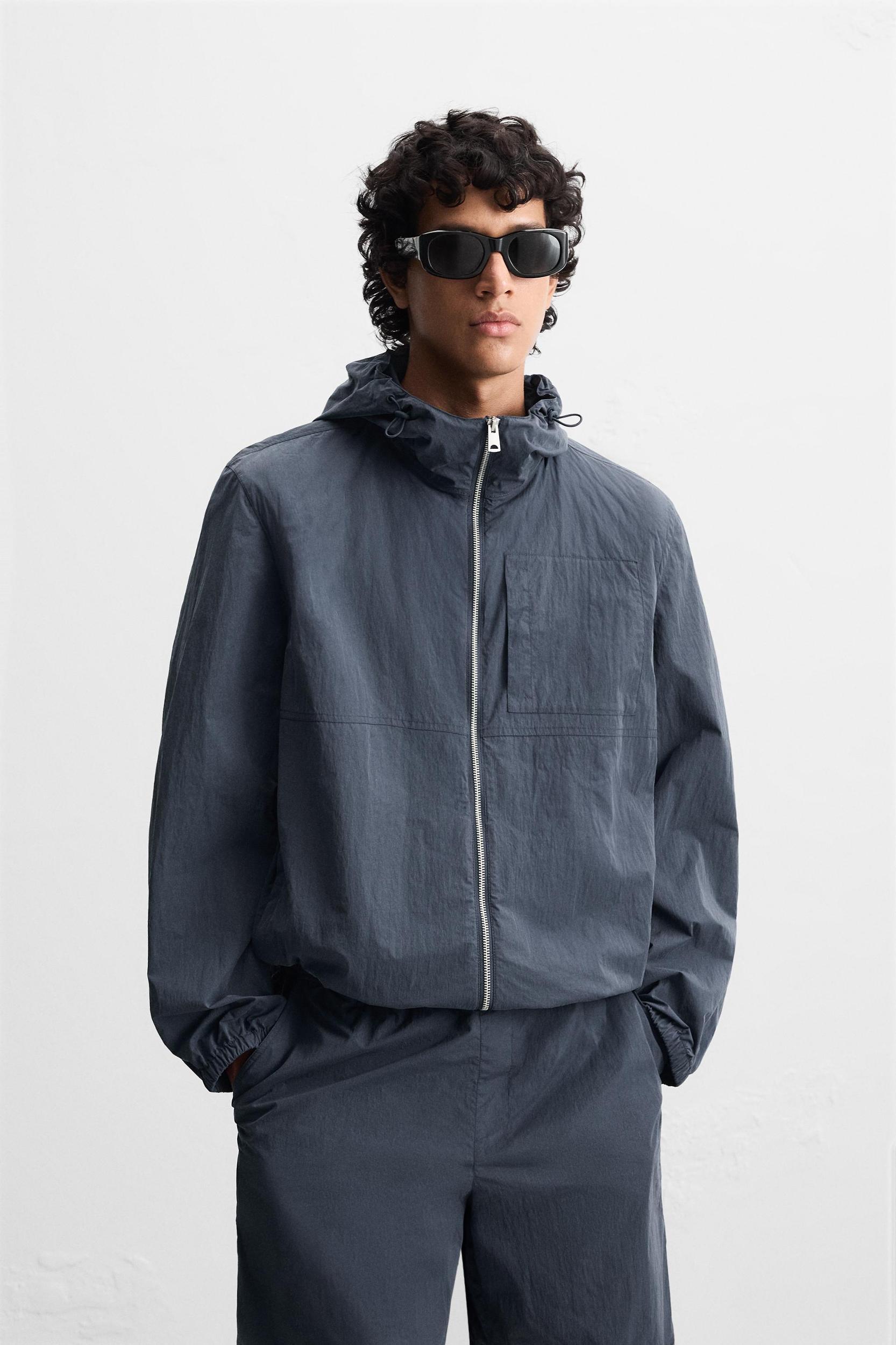 HOODED TECHNICAL JACKET Product Image