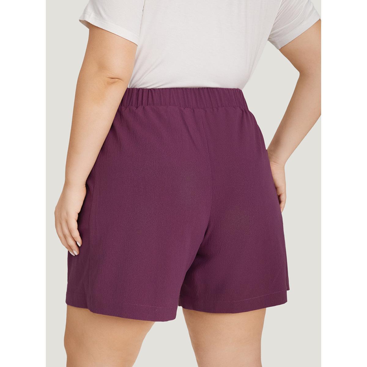 Plus Size Solid Patched Pocket Elastic Waist Shorts Women Purple Casual Elastic Waist Dailywear Shorts BloomChic 26/4X Product Image
