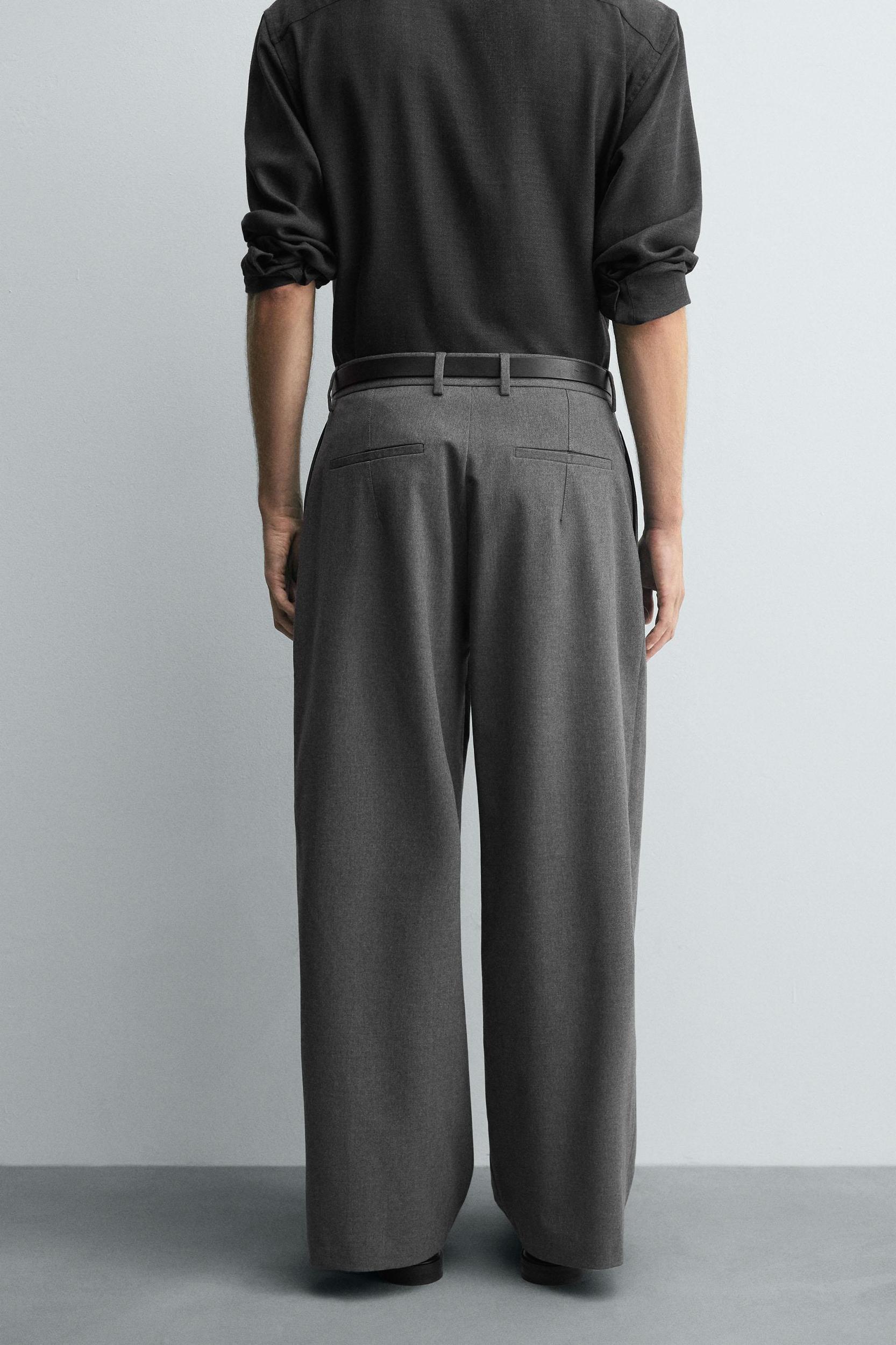 PLEATED WIDE FIT PANTS Product Image