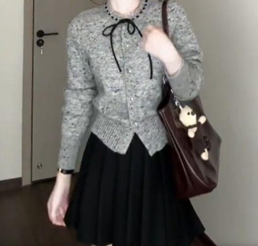 Round Neck Melange Bow Cardigan / High Waist Plain Pleated Mini A-Line Skirt Product Image