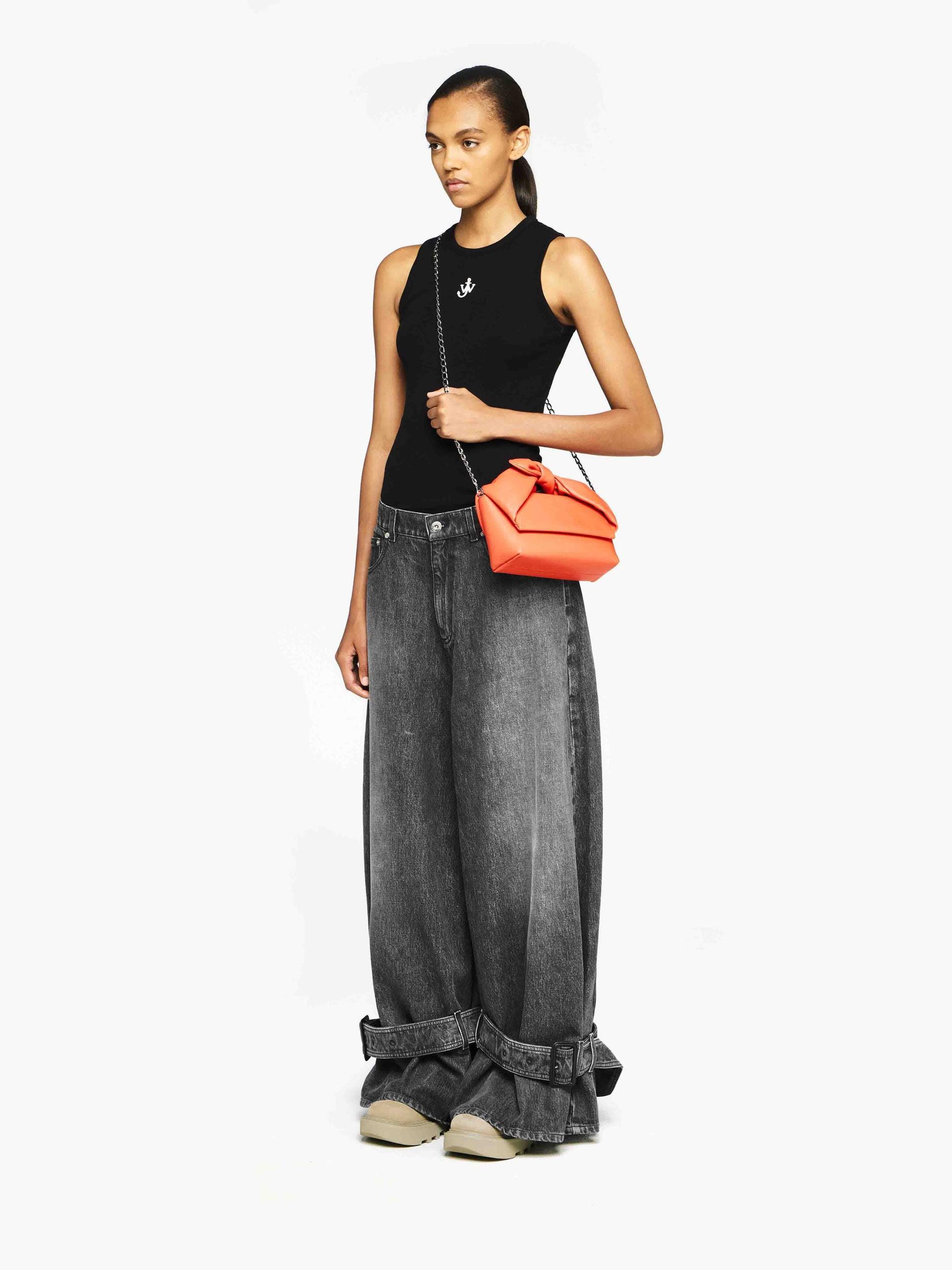 BUCKLED CUFF DENIM JEANS Product Image