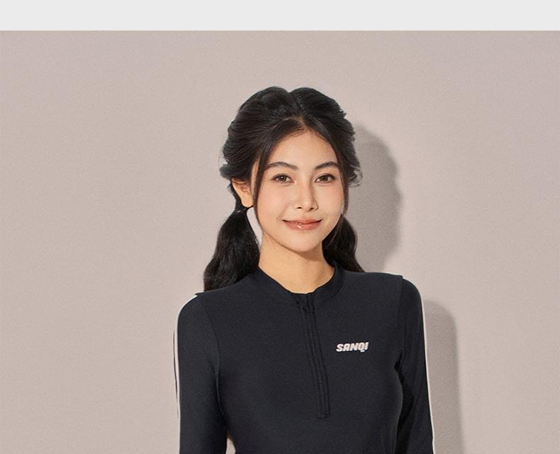 Set: Long-Sleeve Lettering Striped Rash Guard + Contrast Trim Swim Shorts Product Image