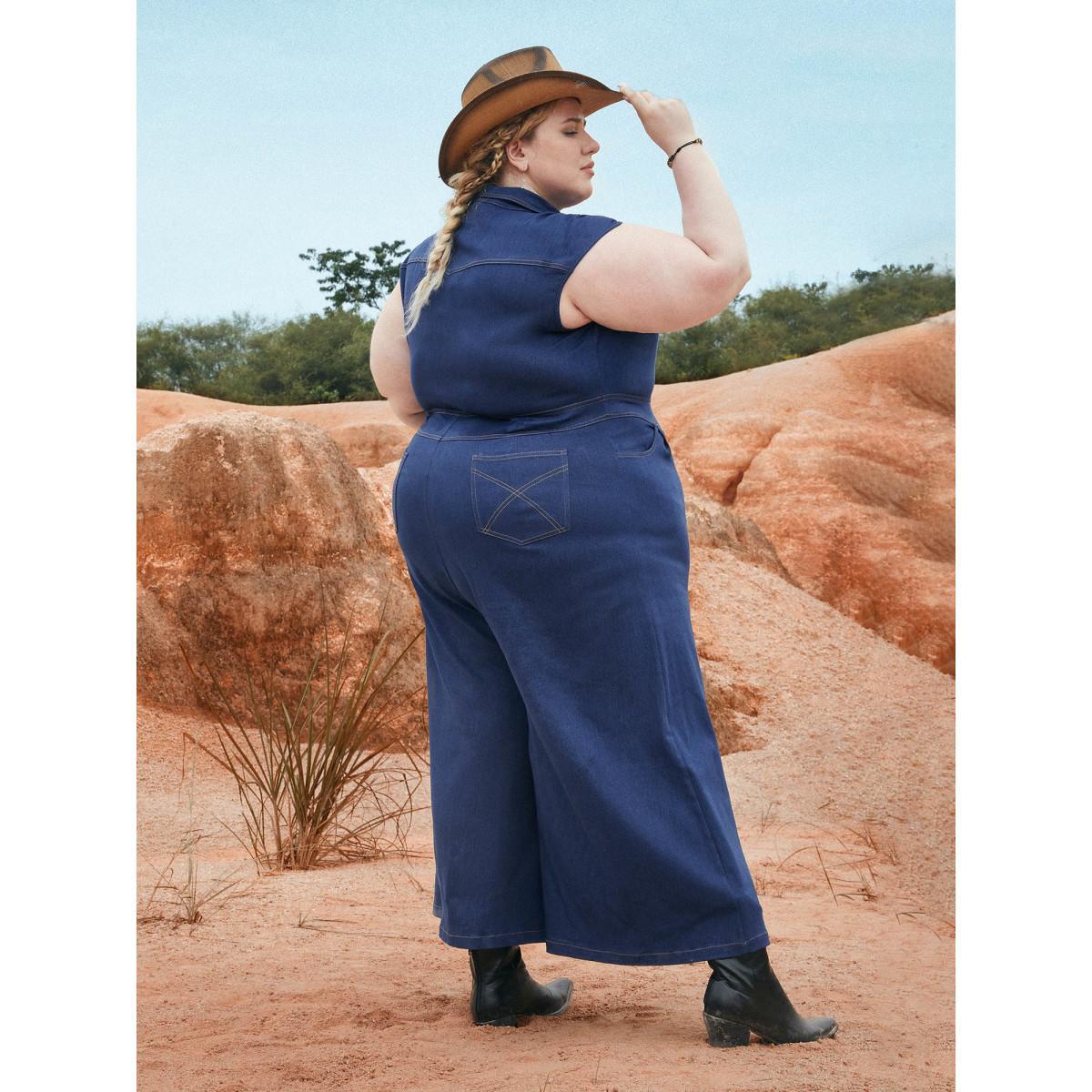 Plus Size Stretch Denim Seamed Flare Jumpsuit Midblue Women Button Medium stretch Vacation Patch pocket Resort Denim Jumpsuits BloomChic 28/5X Product Image