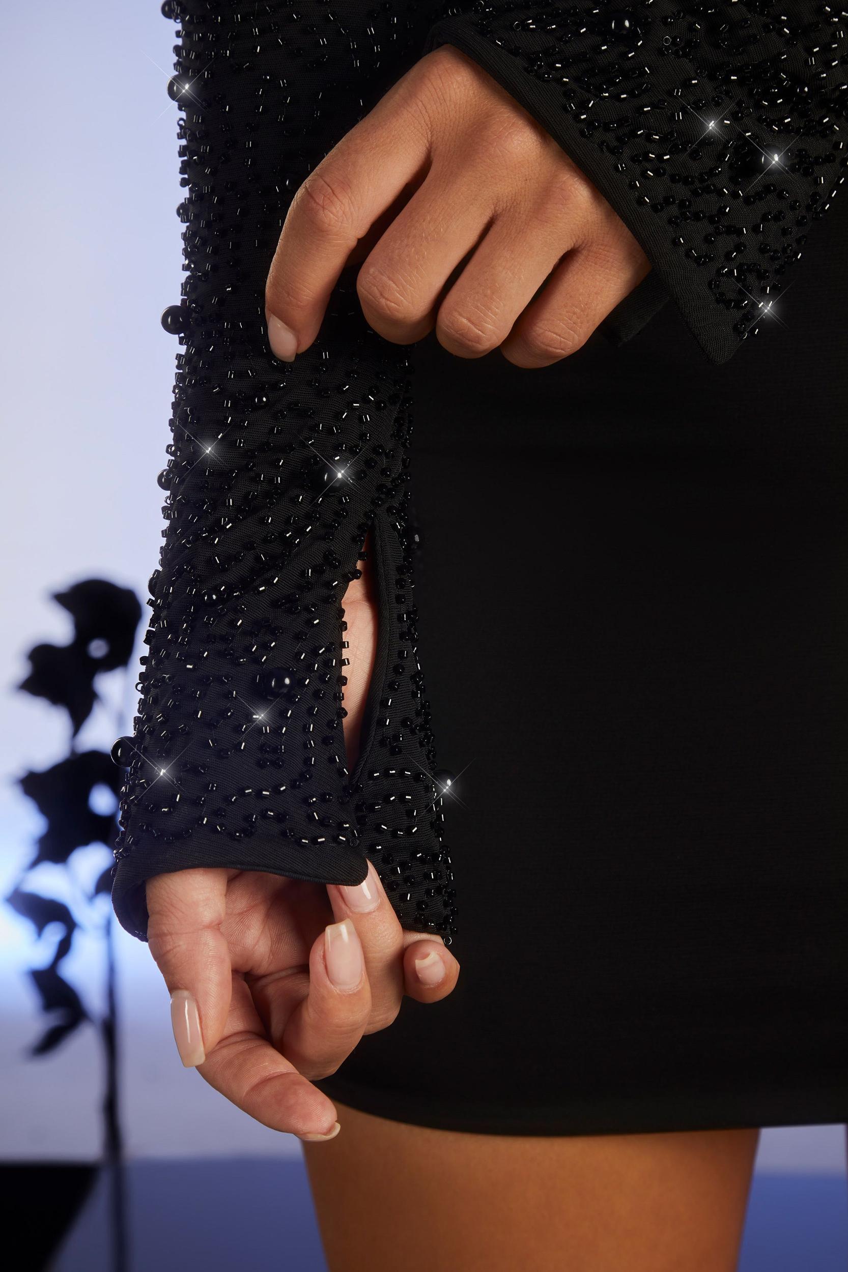 Embellished Long Sleeve Cut Out Mini Dress in Black Product Image