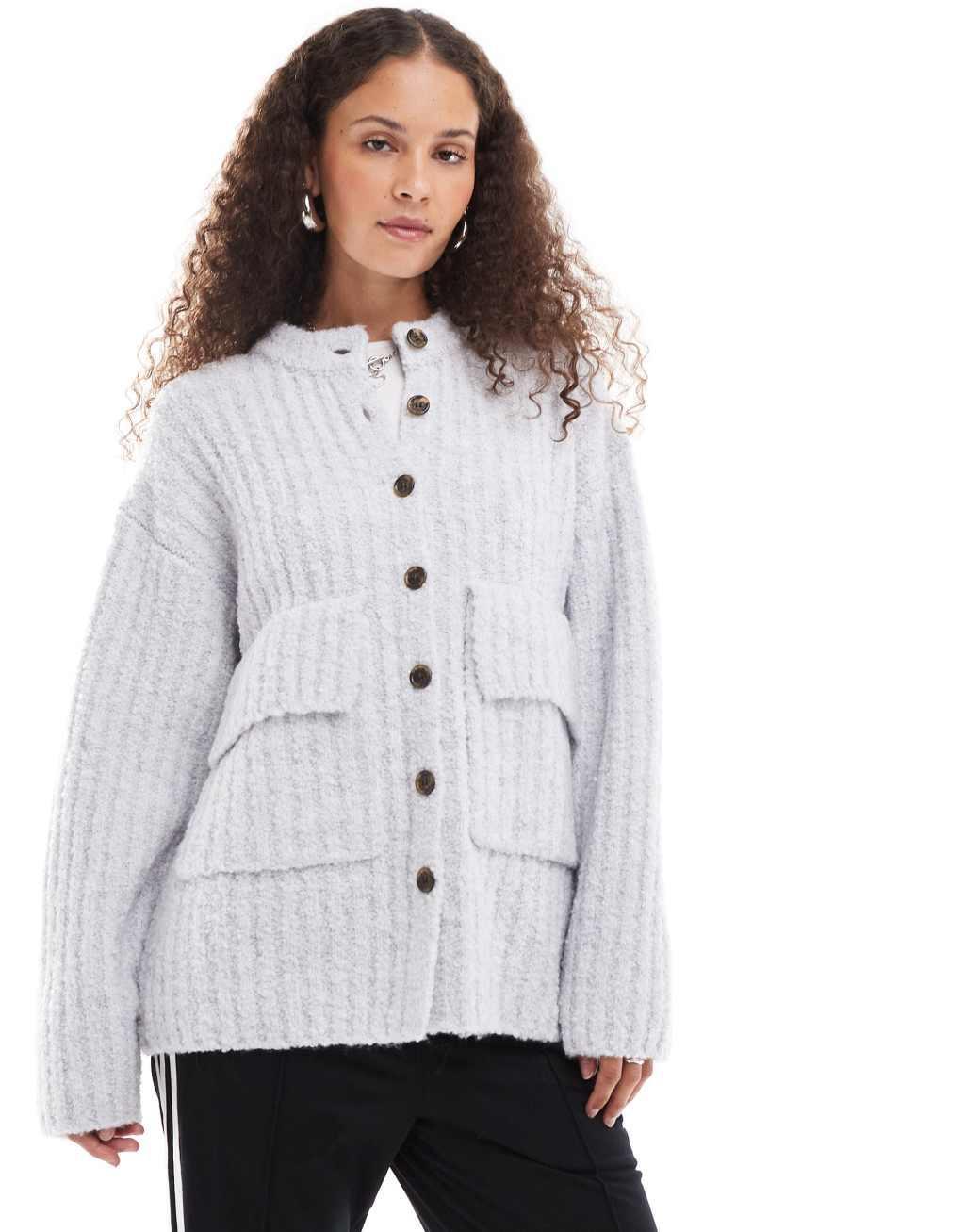 Monki chunky knit rib high neck cardigan with button front and front flap pockets in gray melange Product Image
