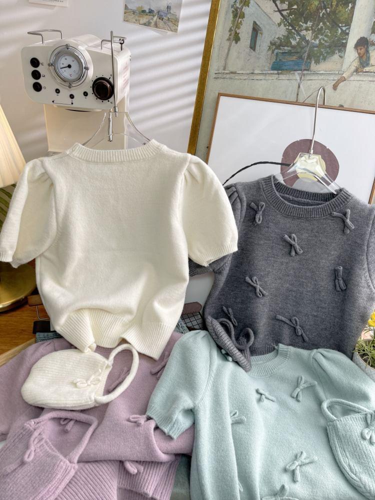 Set: Short-Sleeve Crew Neck Plain Bow Accent Crop Knit Top + Handbag Product Image