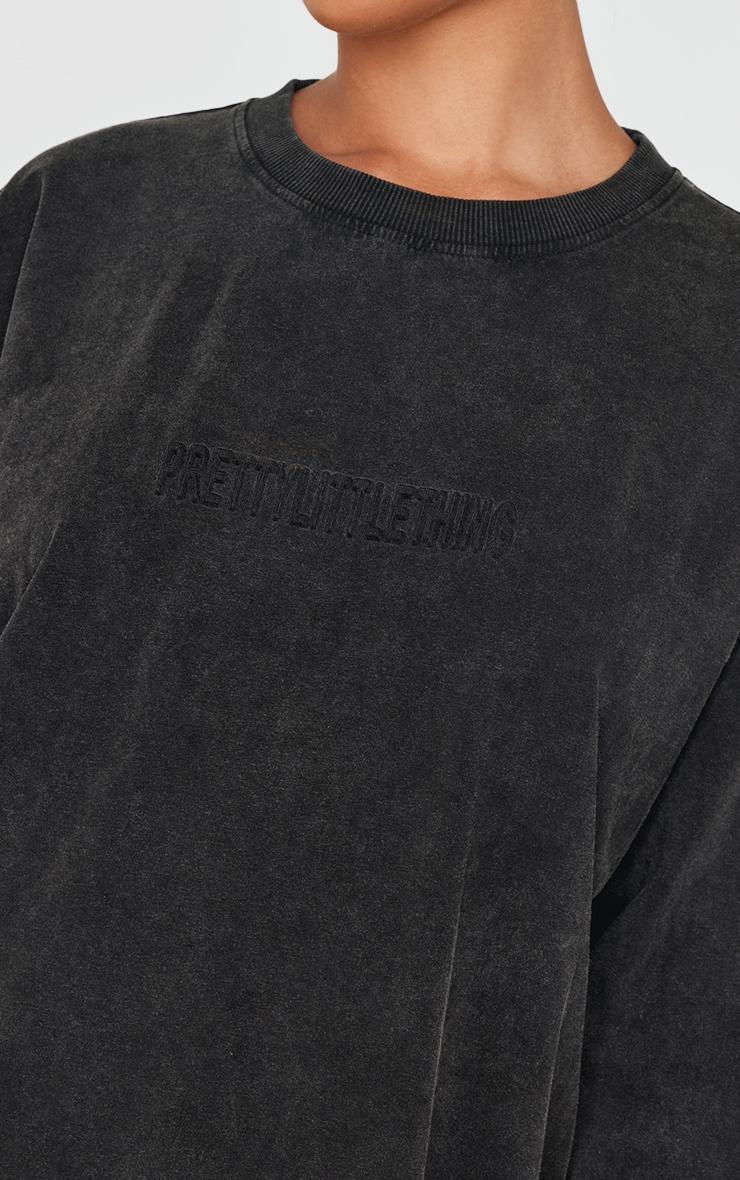 PRETTYLITTLETHING Black Embossed Logo Washed Long Sleeve T-shirt Product Image