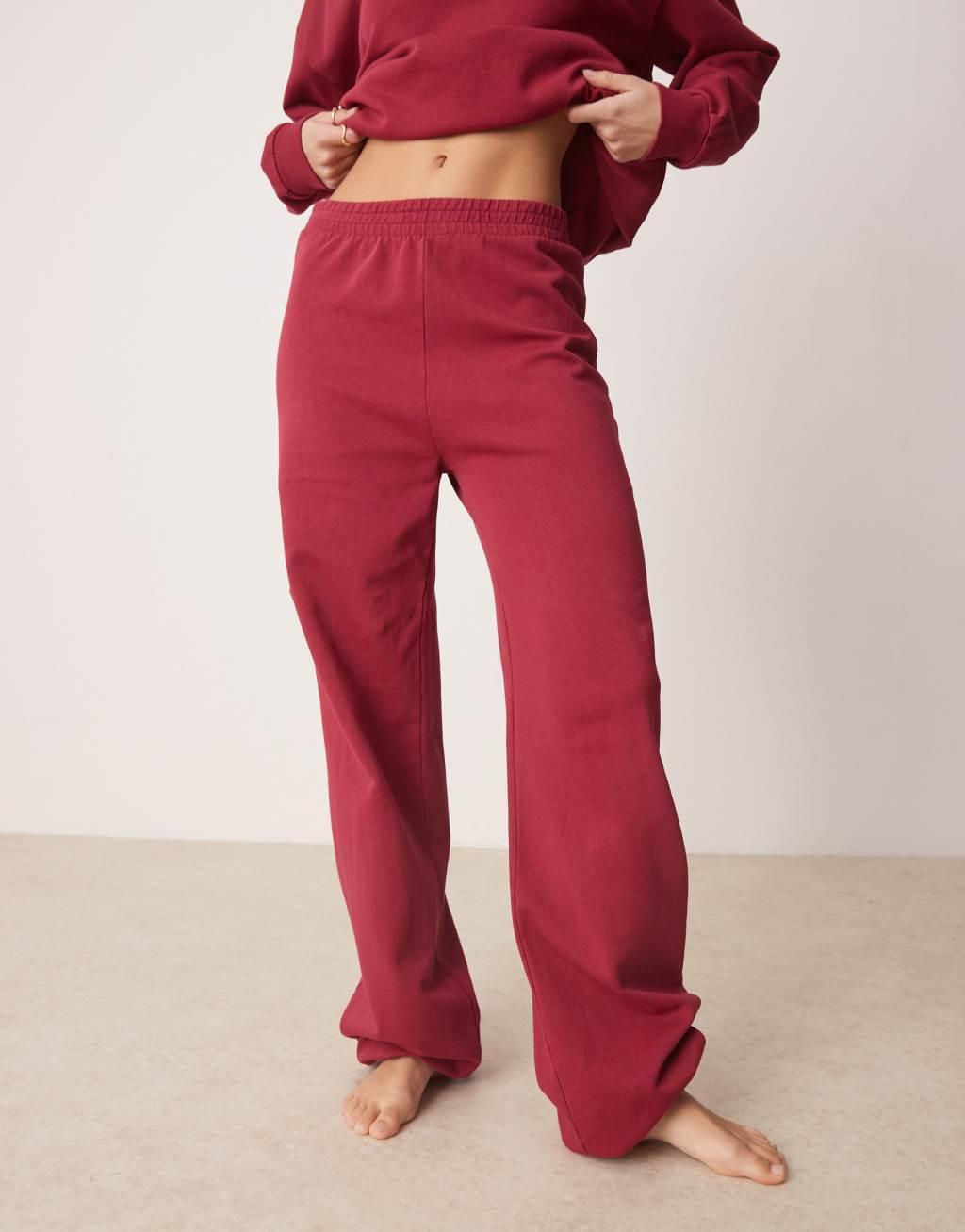 ASOS DESIGN acid wash sweatpants in burgundy - part of a set Product Image