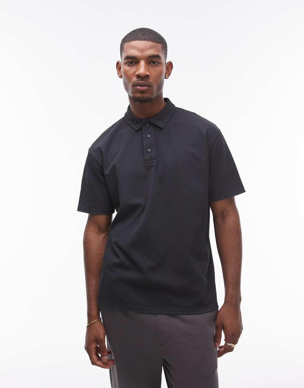 Topman oversized fit polo in washed black Product Image