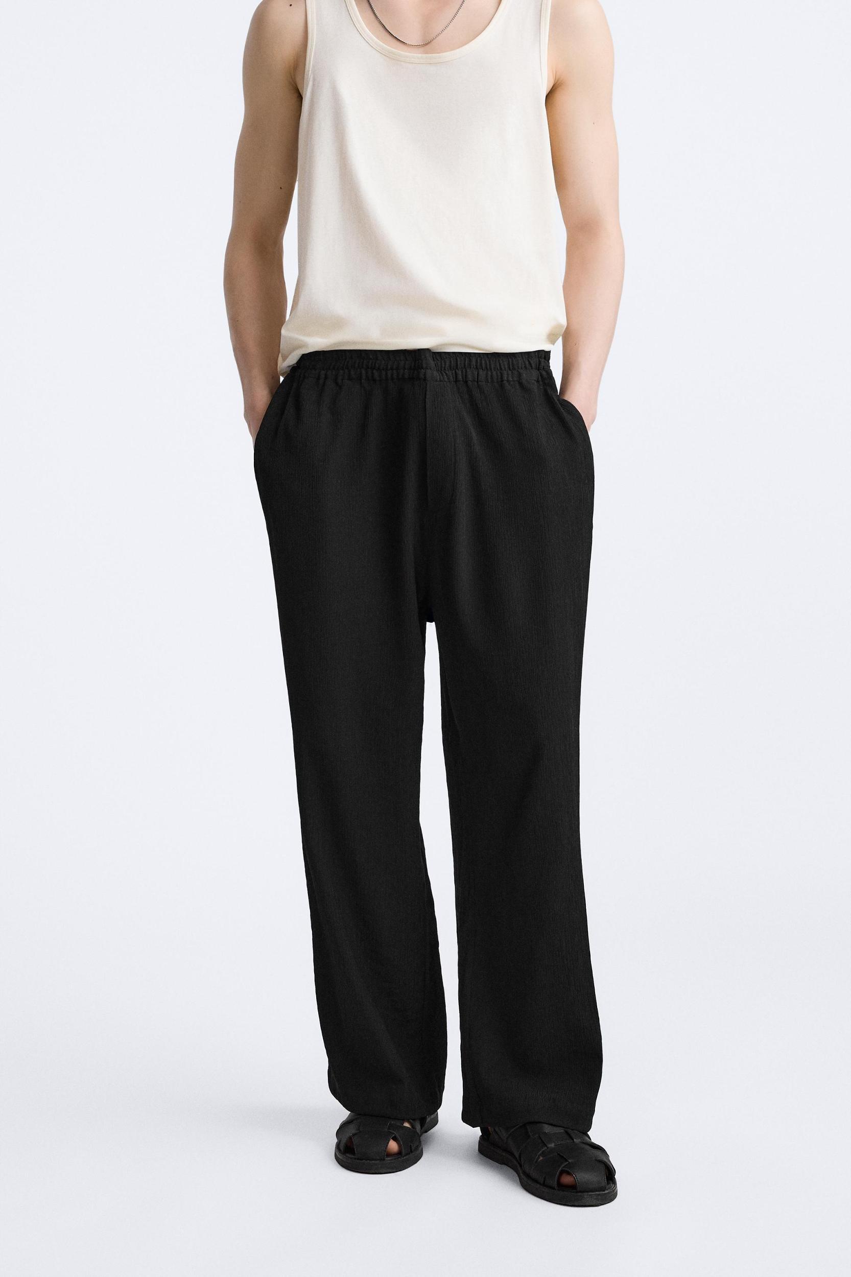 PLEATED PANTS Product Image