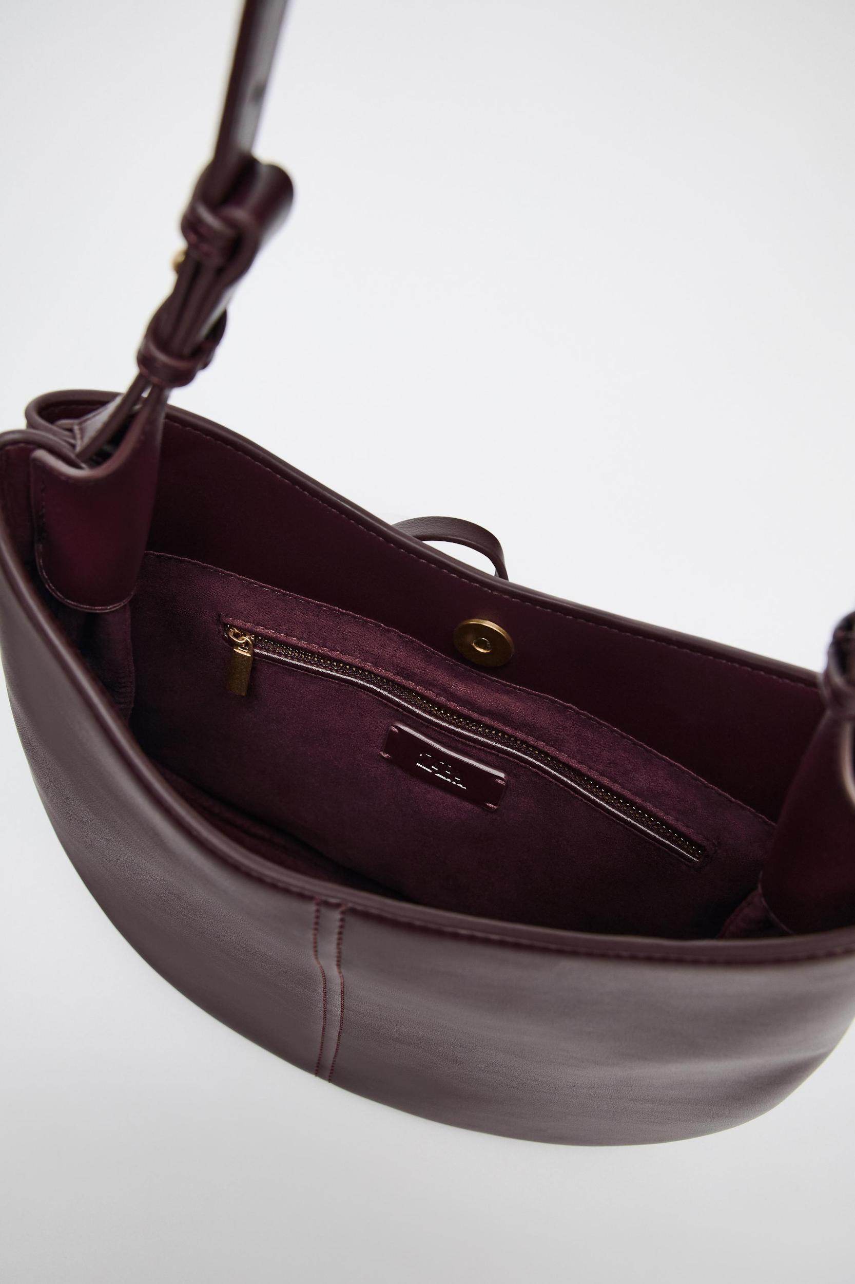 BUCKET BAG WITH PENDANT DETAIL Product Image