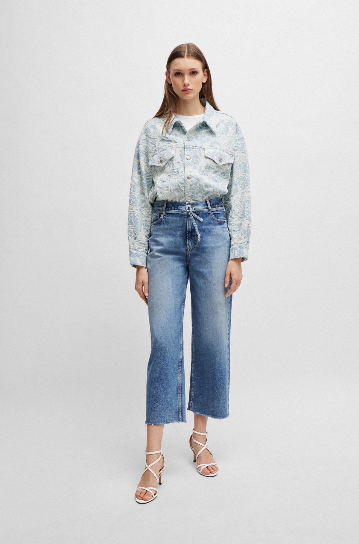 Blue jeans with belt detail Product Image