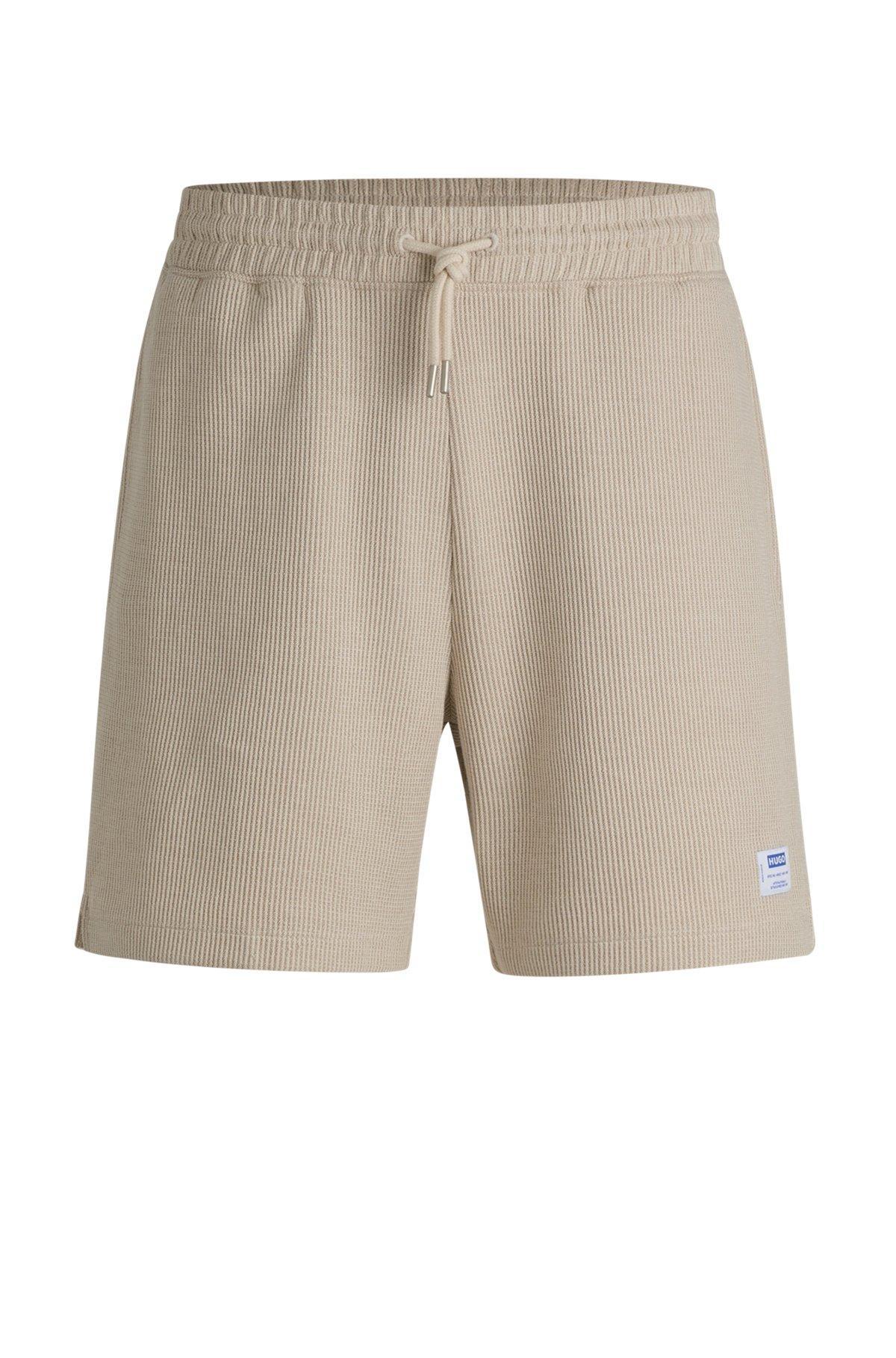 Loose-fit shorts in waffle-structured cotton Product Image