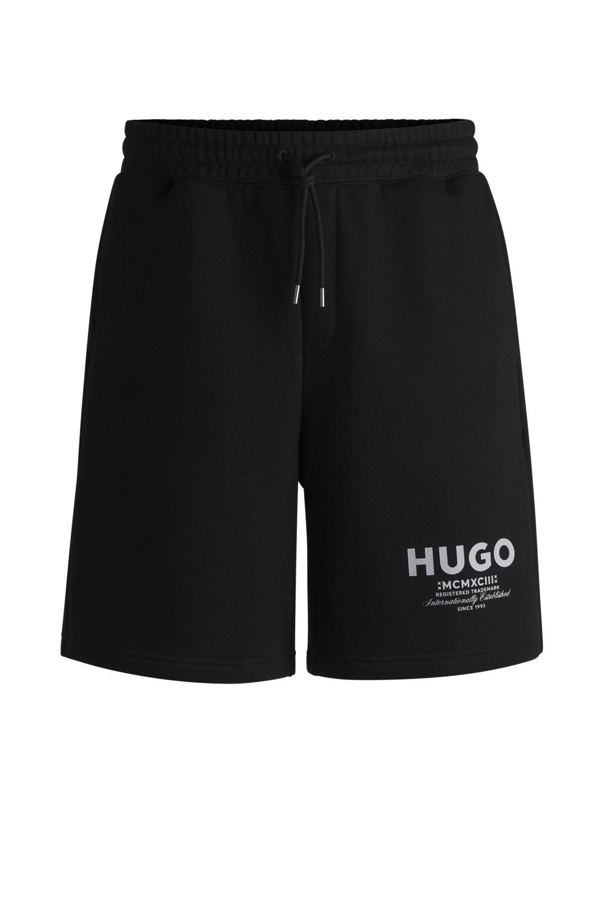 Loose-fit shorts in cotton terry with logo print Product Image