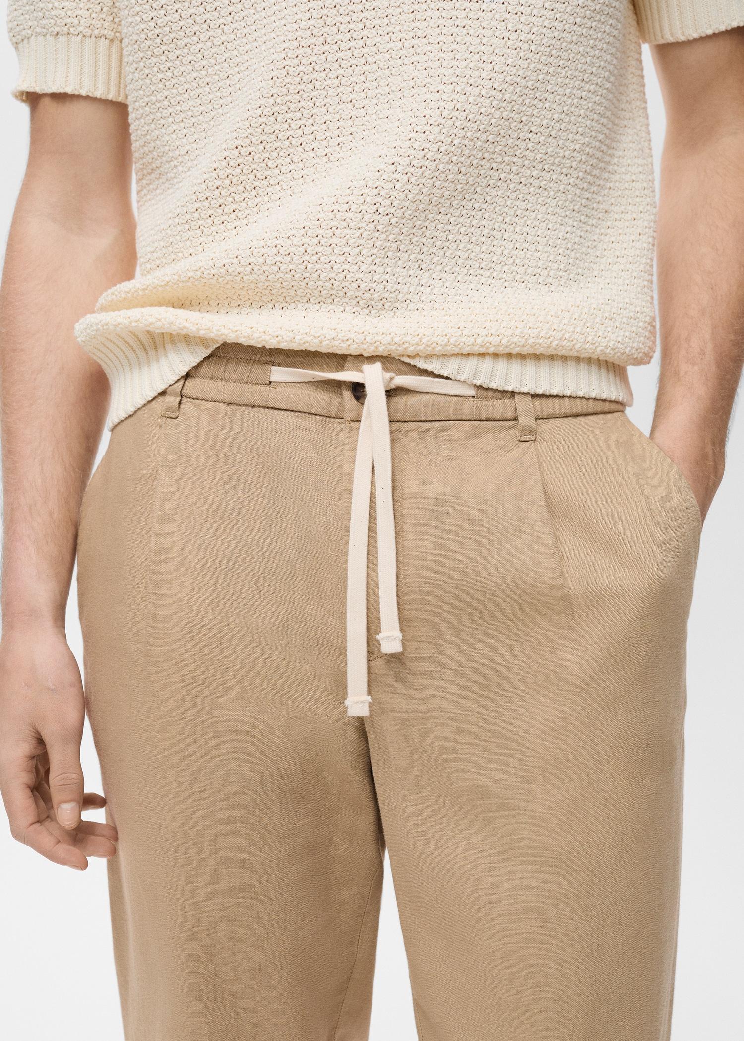 Slim-fit trousers with drawstring - Men | MANGO USA Product Image