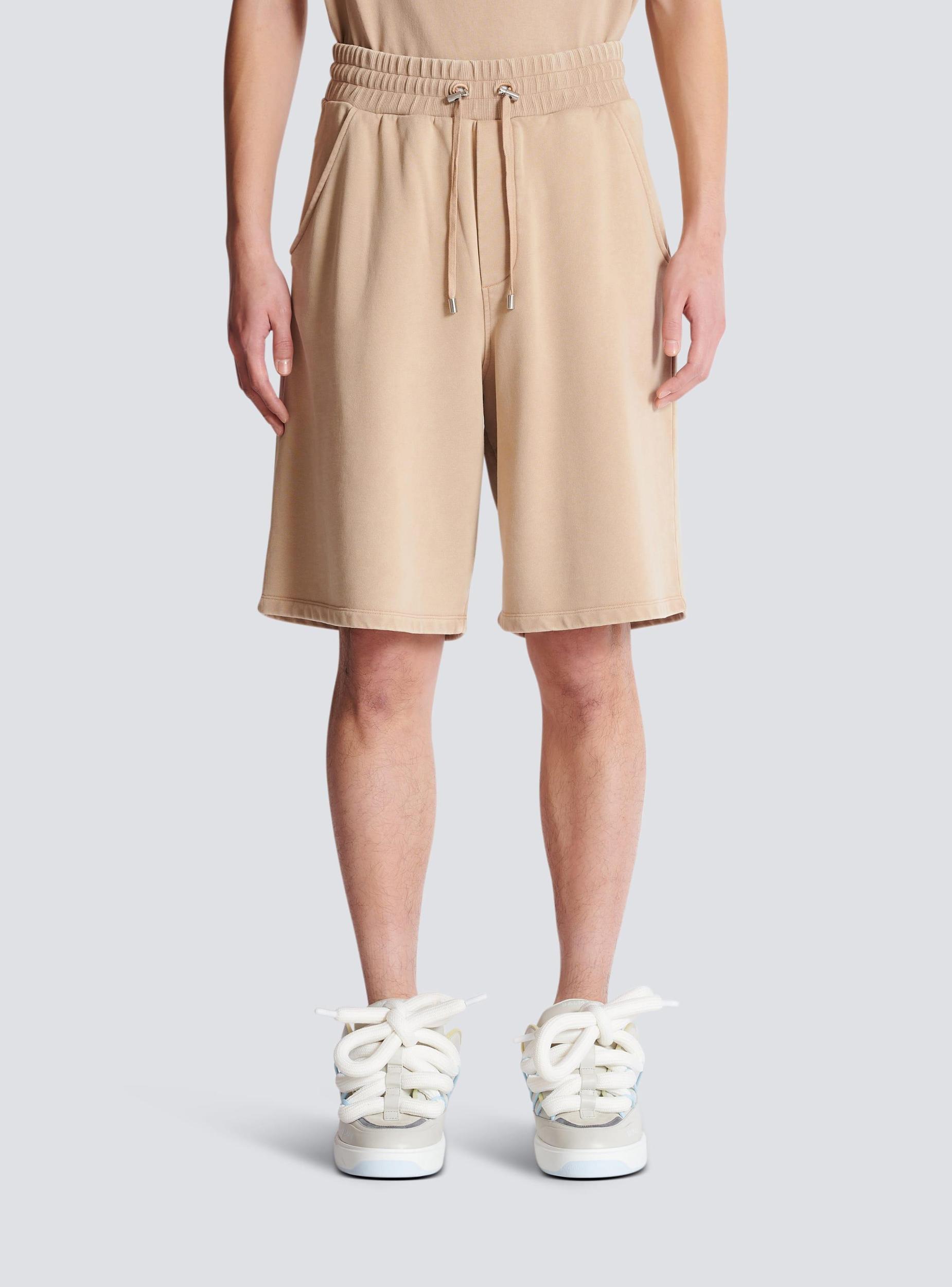 Bermuda shorts with vintage embroidery Product Image