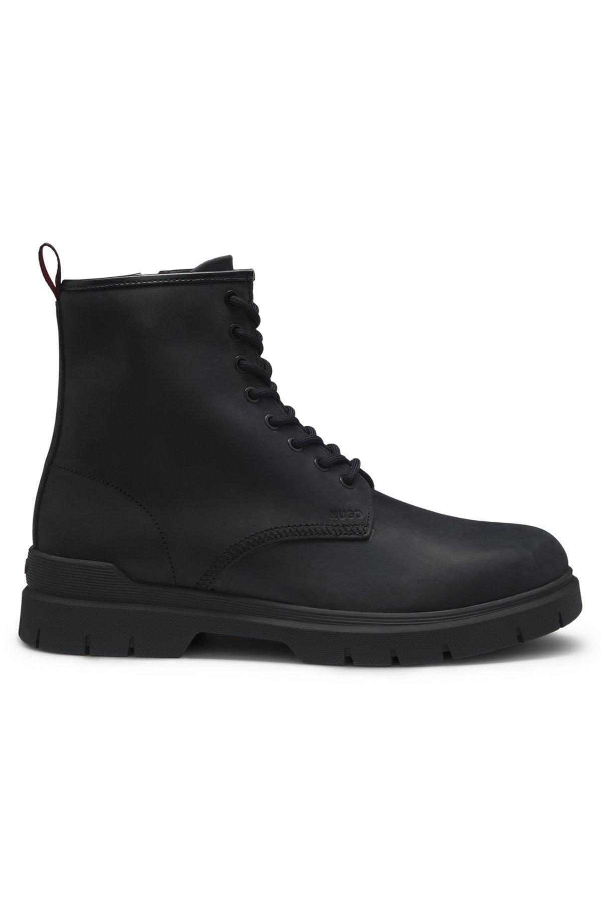 Leather half boots with embossed logo Product Image