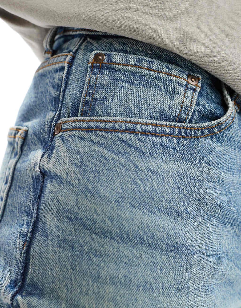 ASOS DESIGN skinny jeans in a tinted vintage mid wash Product Image