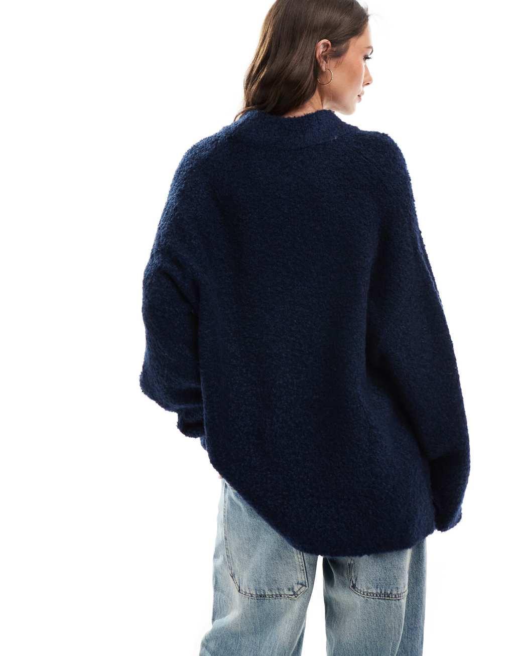 ASOS DESIGN crew neck oversized boucle sweater in navy Product Image
