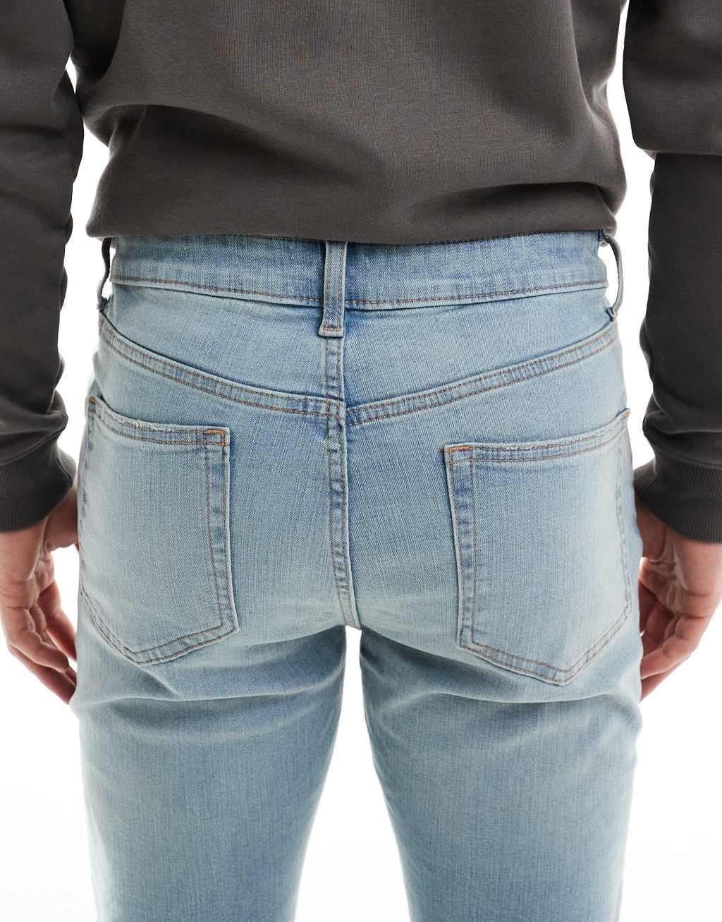 ASOS DESIGN skinny jeans in light wash blue with tint  Product Image