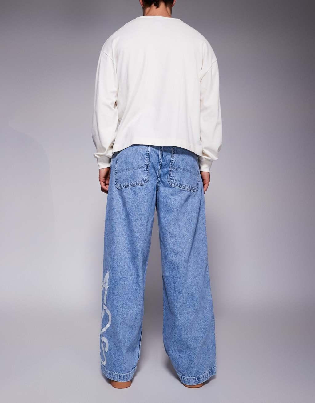 ASOS DESIGN super baggy jeans with ADS logo in mid wash blue Product Image