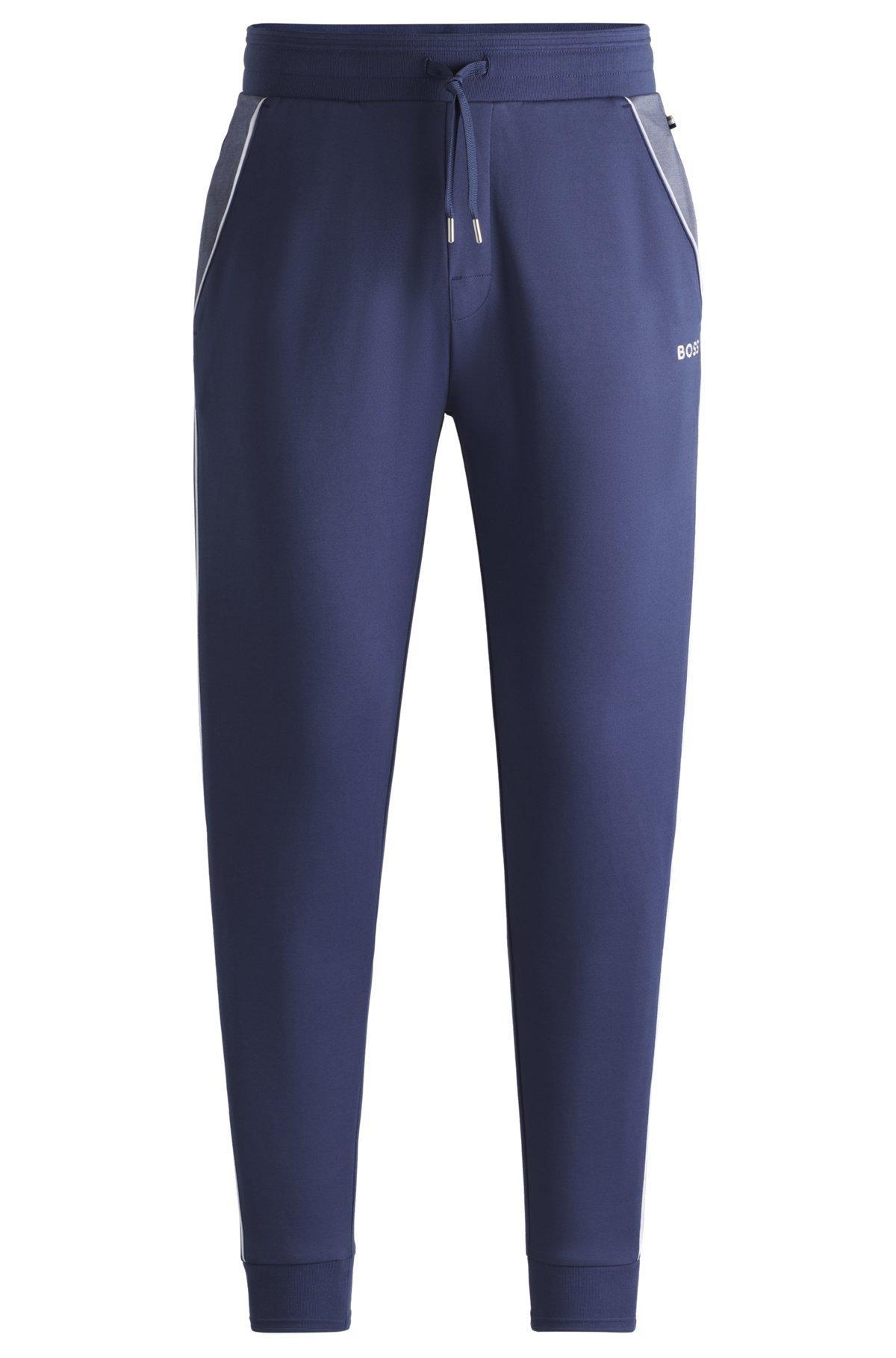 Tracksuit bottoms with contrast piping Product Image