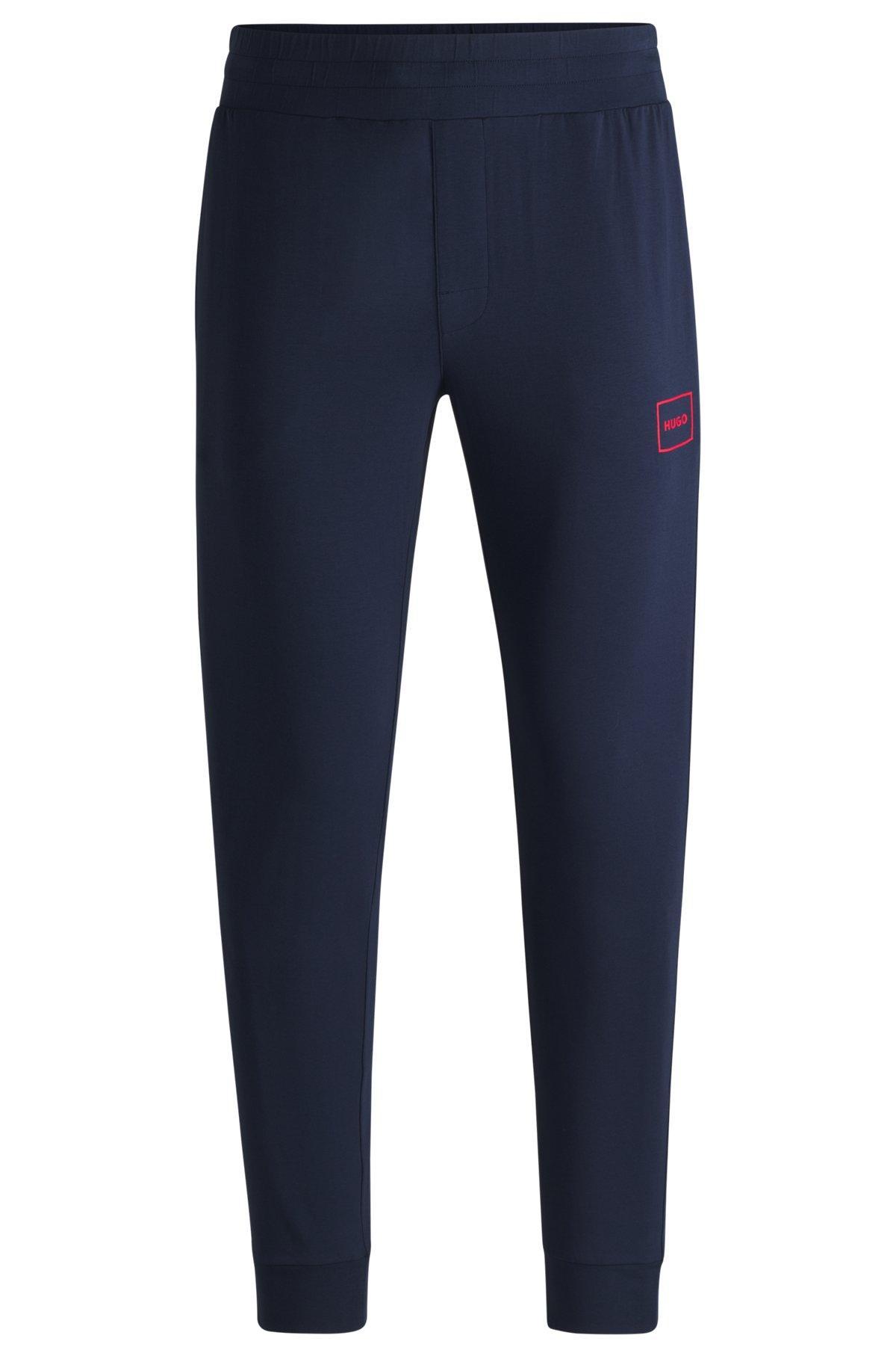 Stretch-cotton tracksuit bottoms with logo print Product Image