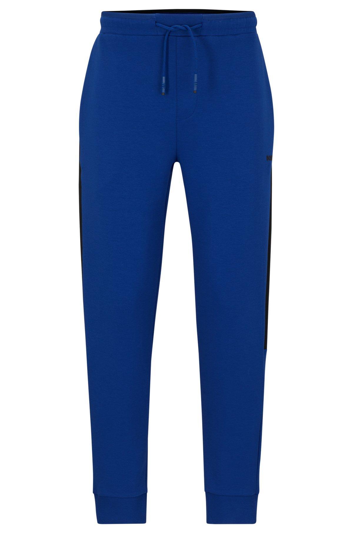 Cotton-blend tracksuit bottoms with side-stripe tape Product Image