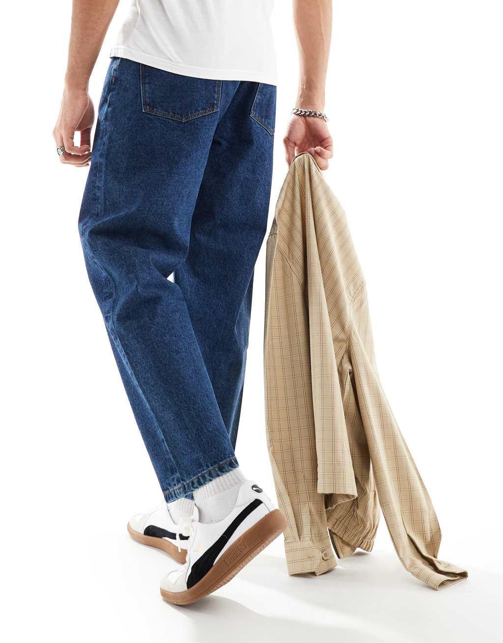ASOS DESIGN balloon fit jeans in mid wash blue Product Image