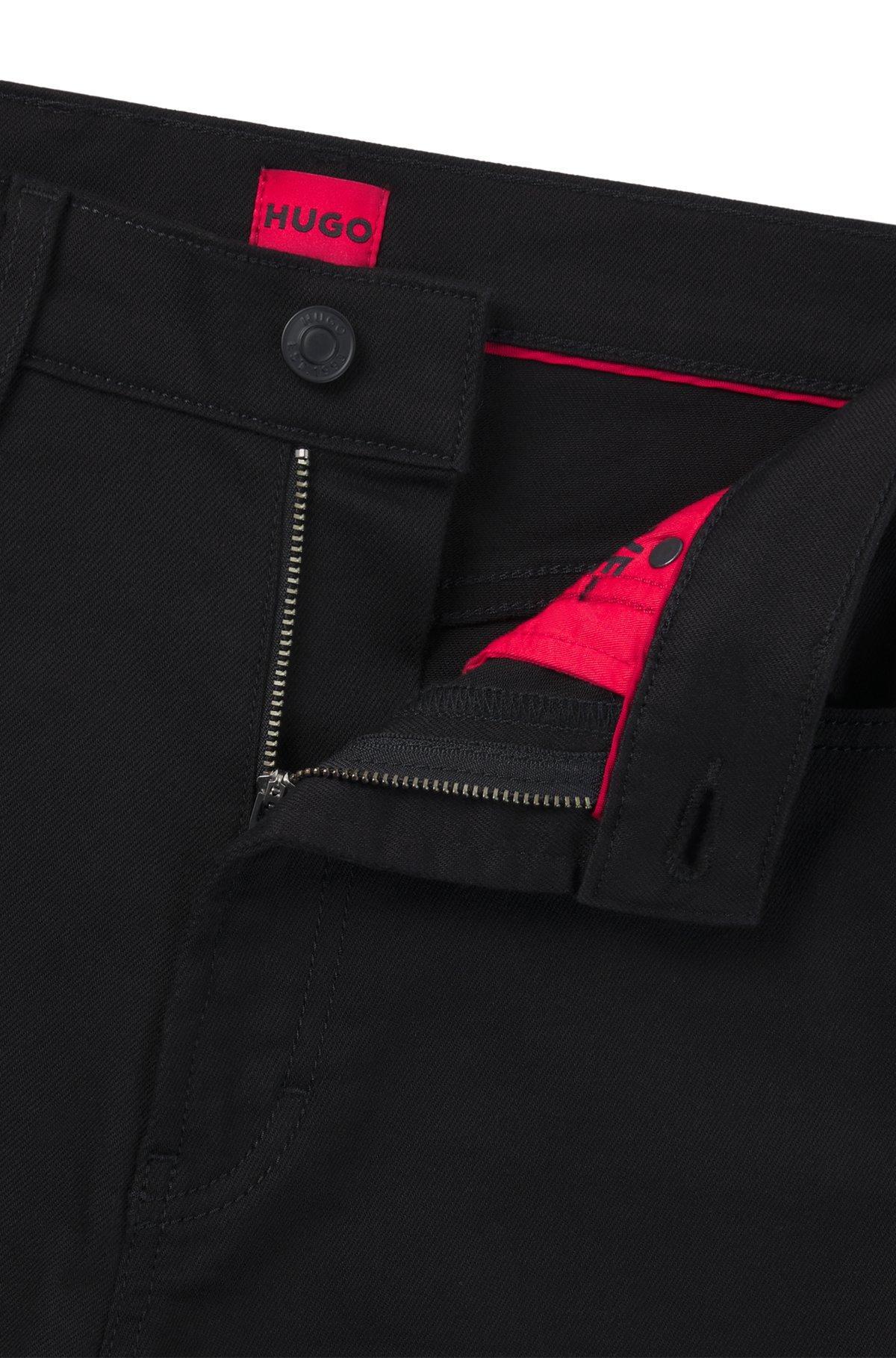 Slim-fit jeans in stay-black stretch denim Product Image