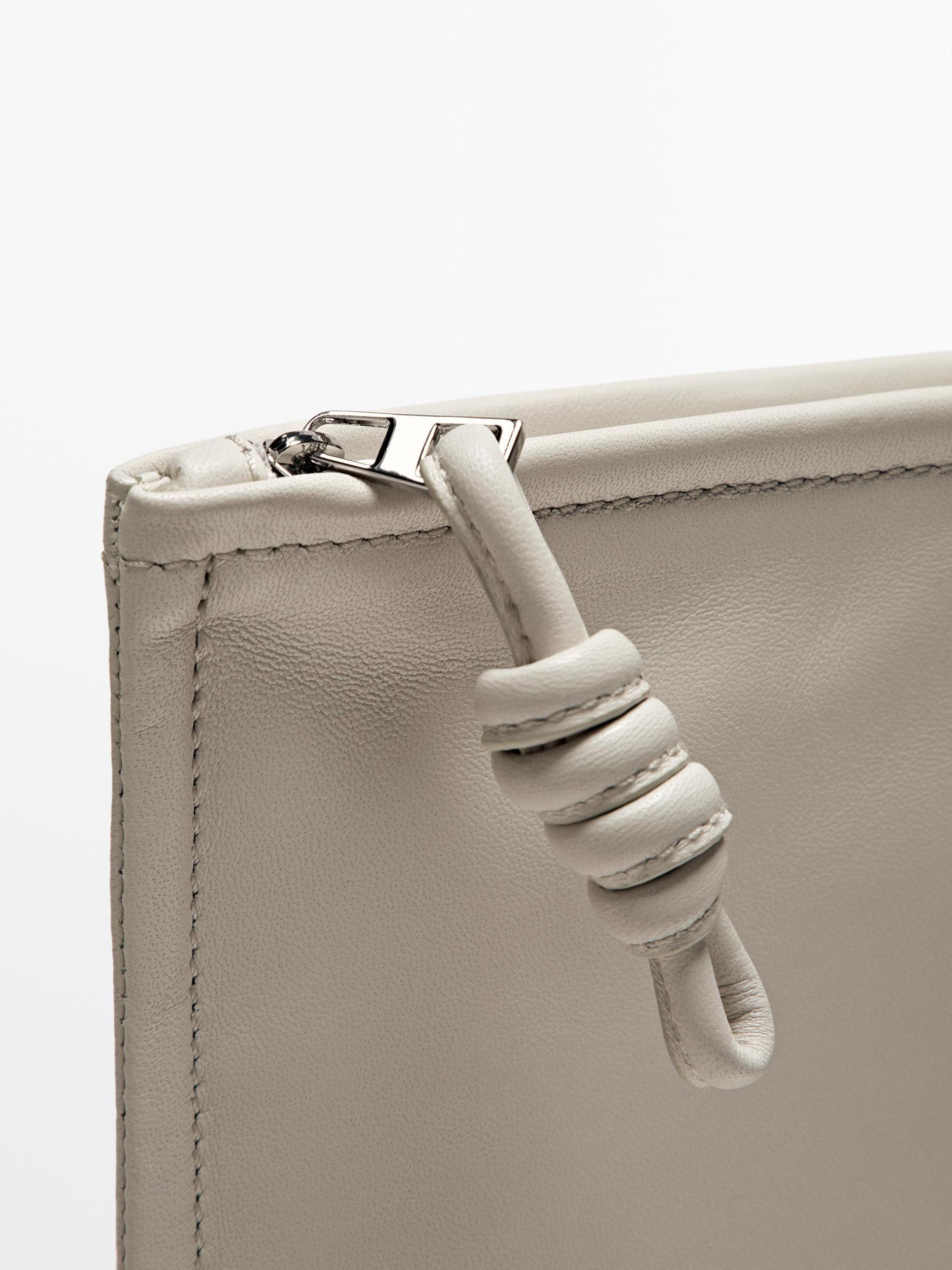 Small nappa leather pouch bag with knot Product Image