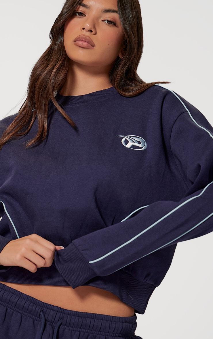 PRETTYLITTLETHING Navy Embroidered Contrast Piping Sweatshirt Product Image