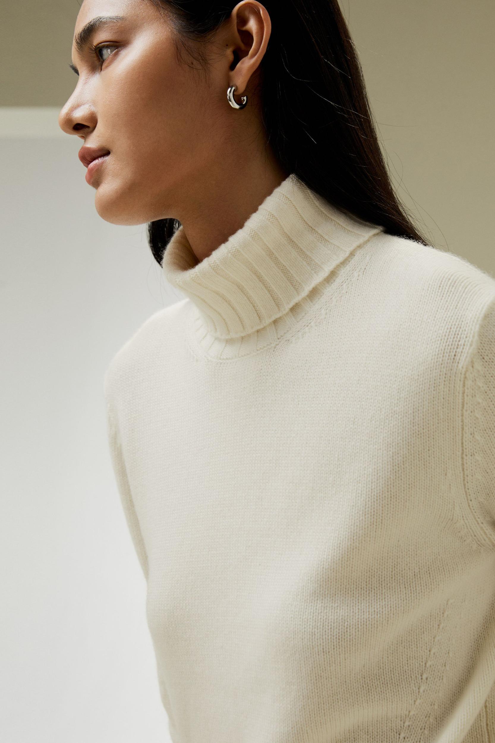 Turtleneck Sweater with Rib Hemline Product Image
