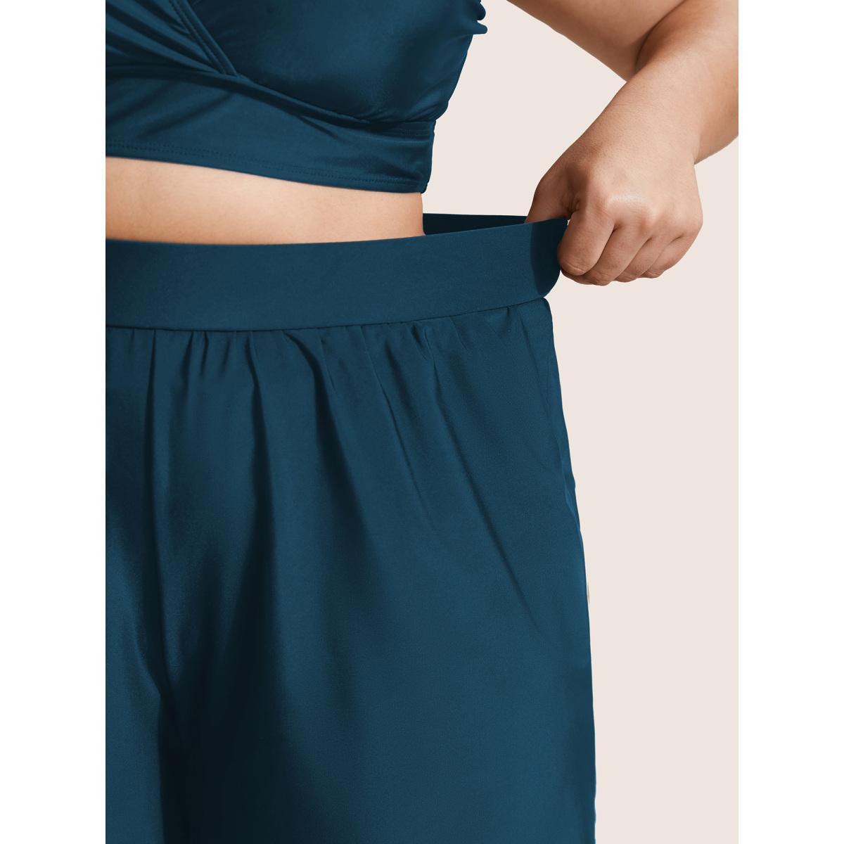 Plus Size High Waisted Pockets Solid Pleated Swim Bottom Women's Swimwear Cyan Beach Gathered High stretch Bodycon High Rise Slanted pocket Curve Swim Bottoms BloomChic 22-24/3X Product Image