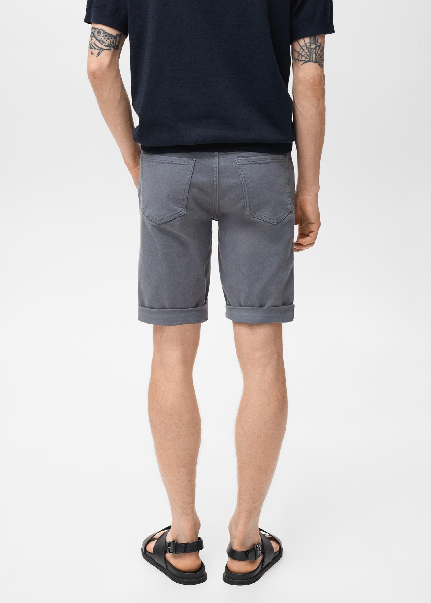 Slim-fit denim bermuda shorts - Men | MANGO USA Product Image