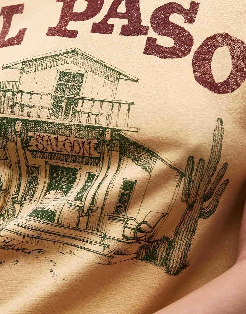 Topshop graphic El Paso boxy tee in light mustard Product Image
