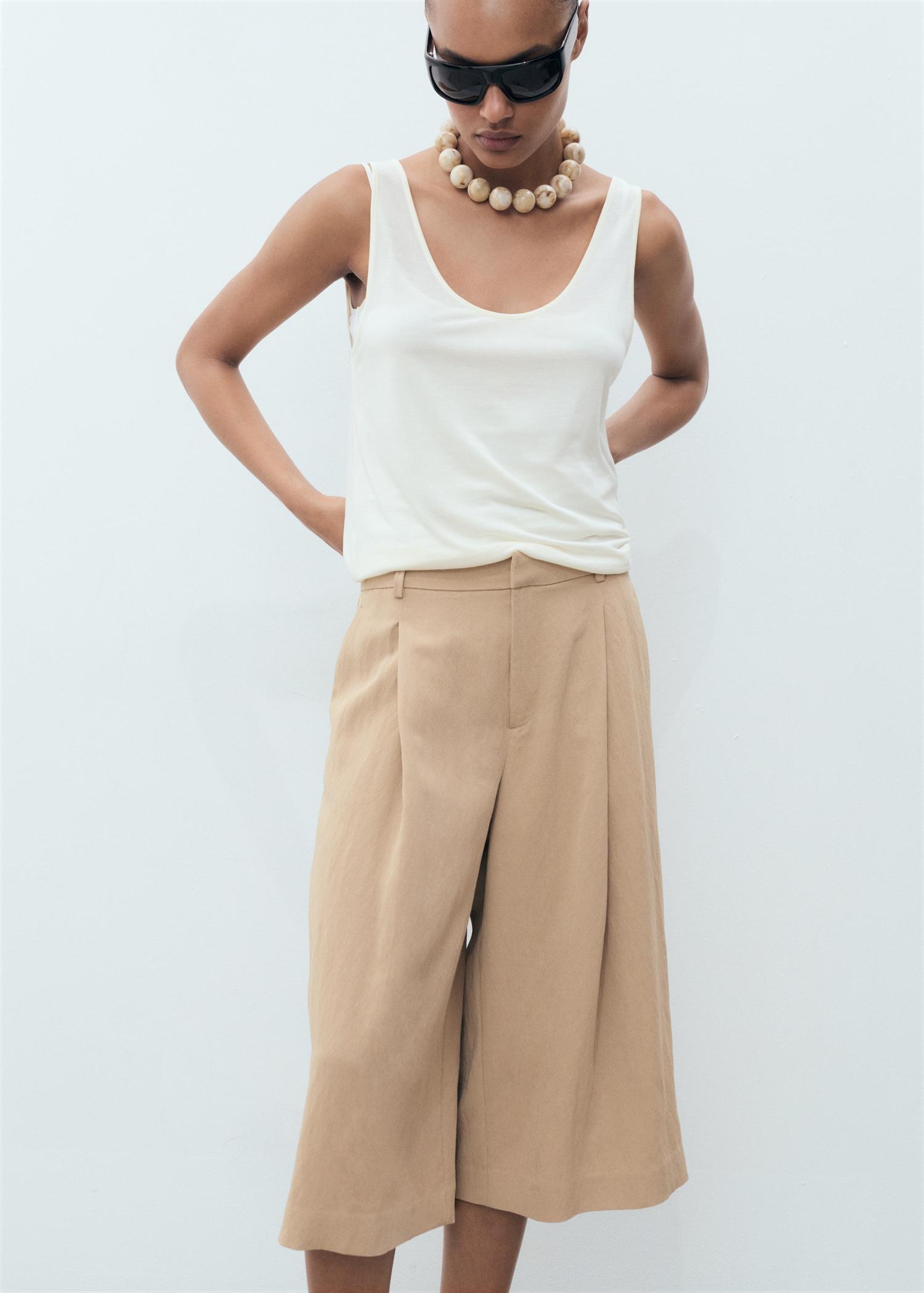 Lyocell pleated bermuda shorts - Women | MANGO USA Product Image