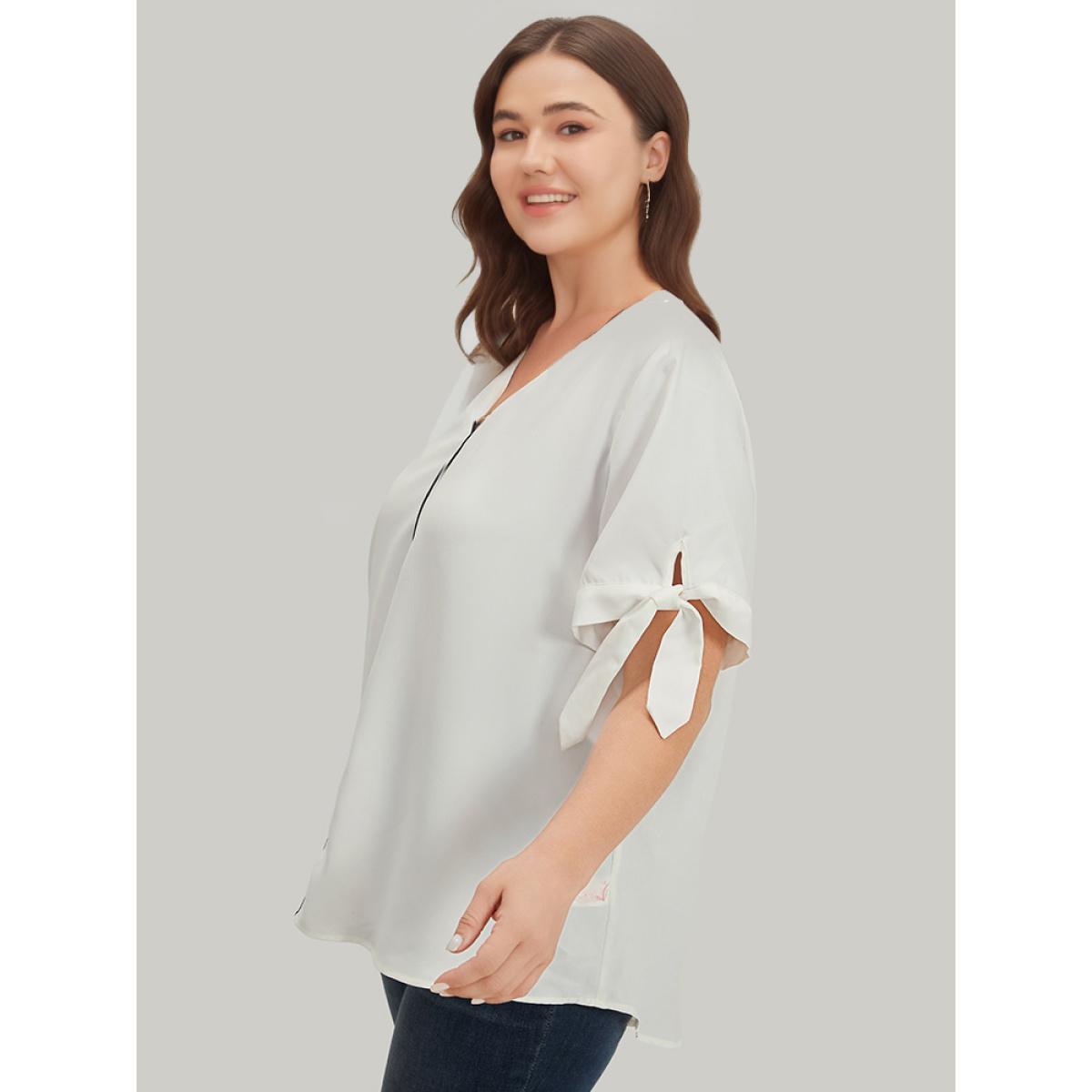 Plus Size Ivory Contrast Trim Knot High Low Hem Blouse Women Office Short sleeve V-neck Work Blouses BloomChic 22-24/3X Product Image