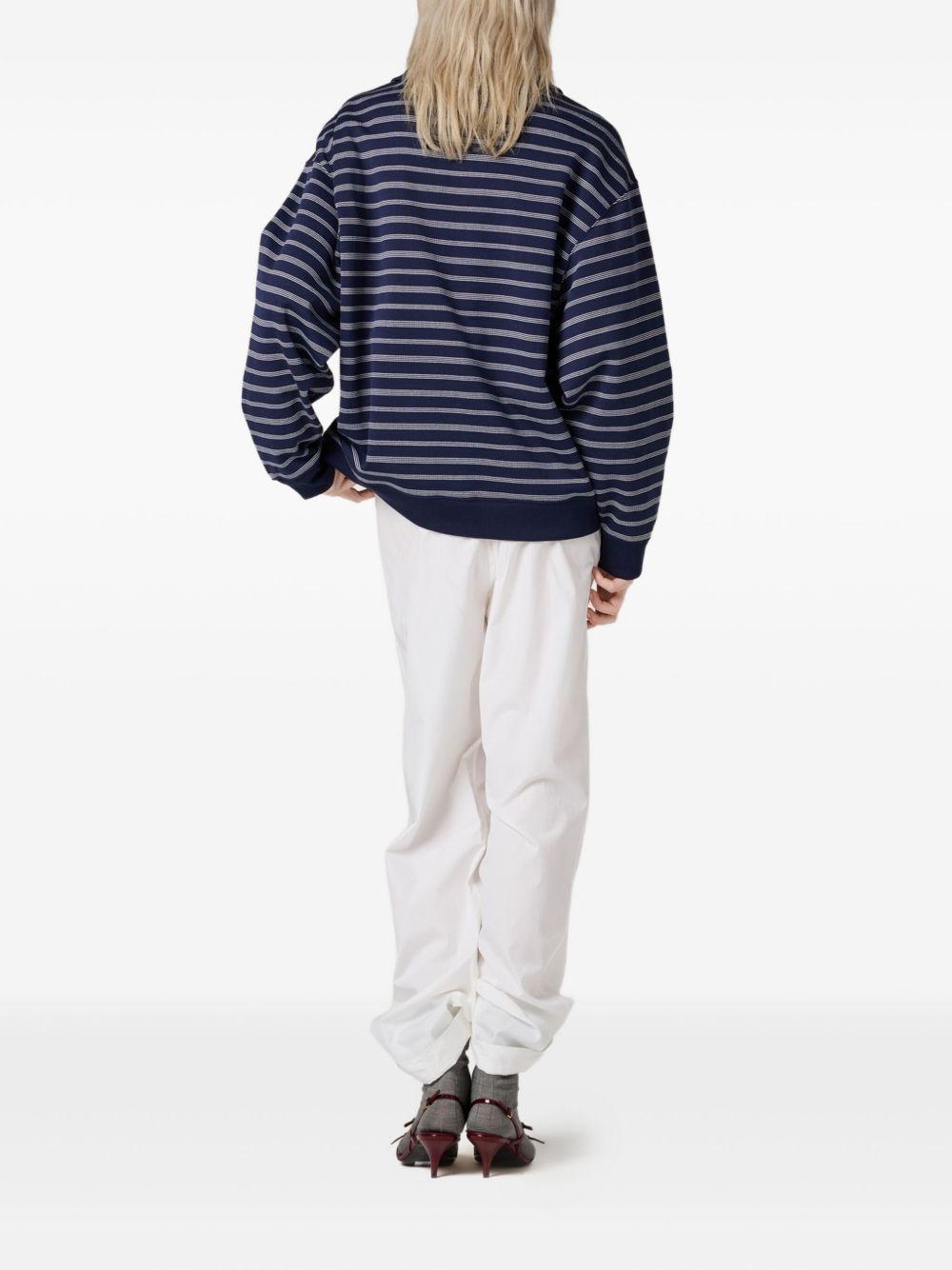 striped half-zip polo shirt Product Image