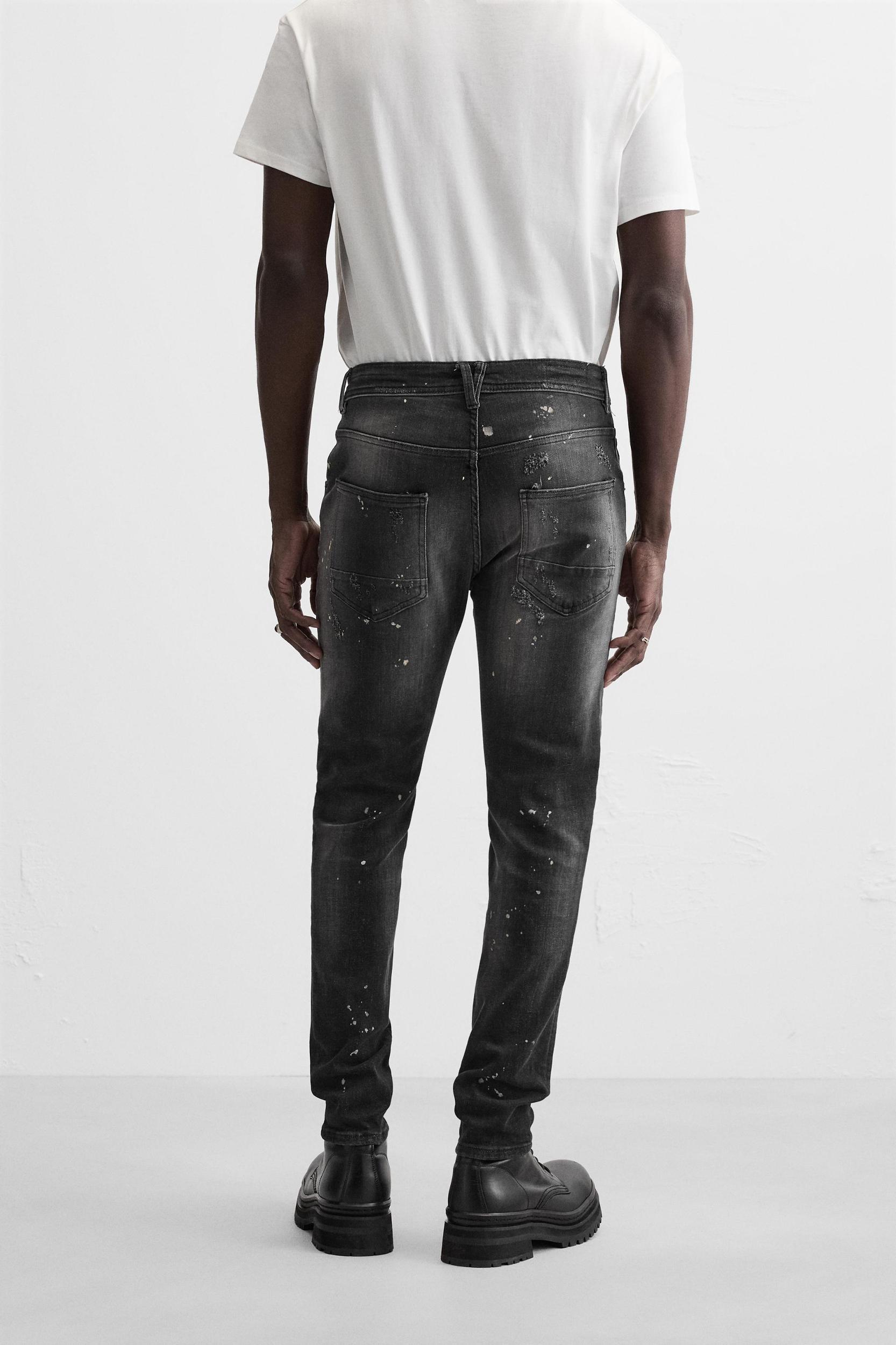 SPLATTERED RIPPED SKINNY JEANS Product Image