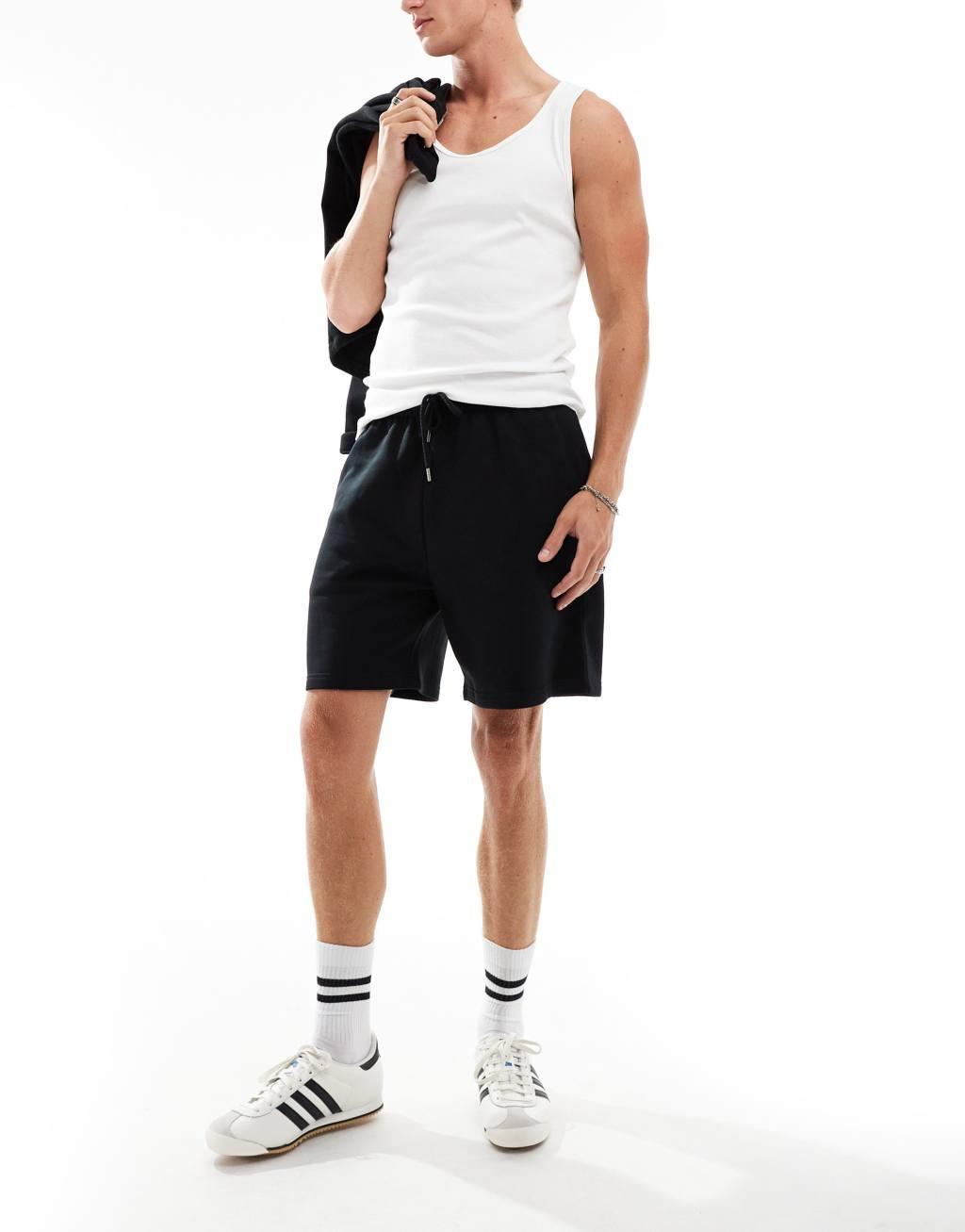 COLLUSION jersey shorts in black Product Image