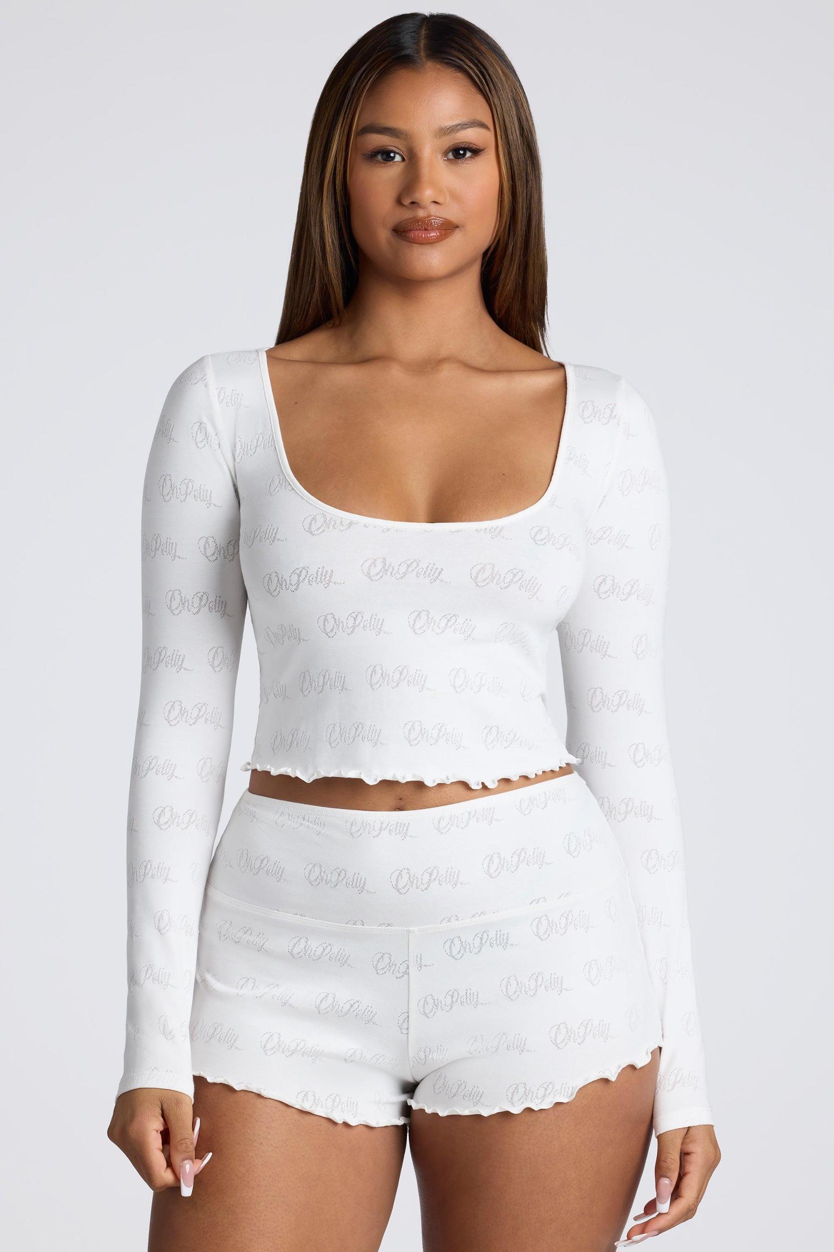 Long Sleeve Scoop Neck Pointelle Crop Top in White Product Image